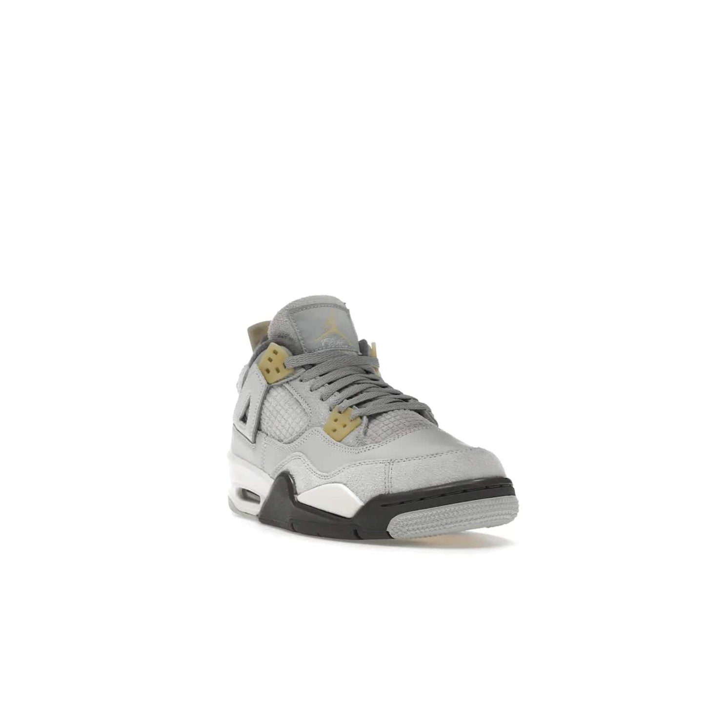 Jordan 4 Retro SE Craft Photon Dust (GS) - Image 7 - Only at www.BallersClubKickz.com - Shop the Jordan 4 Retro SE Craft Photon Dust (GS), the ultimate mix of style and comfort. With photonic dust, pale vanilla, off-white, grey fog, flat pewter and sail colorway, foam midsole, and rubber outsole, don't miss this special edition Jordan 4 releasing Feb 11, 2023.