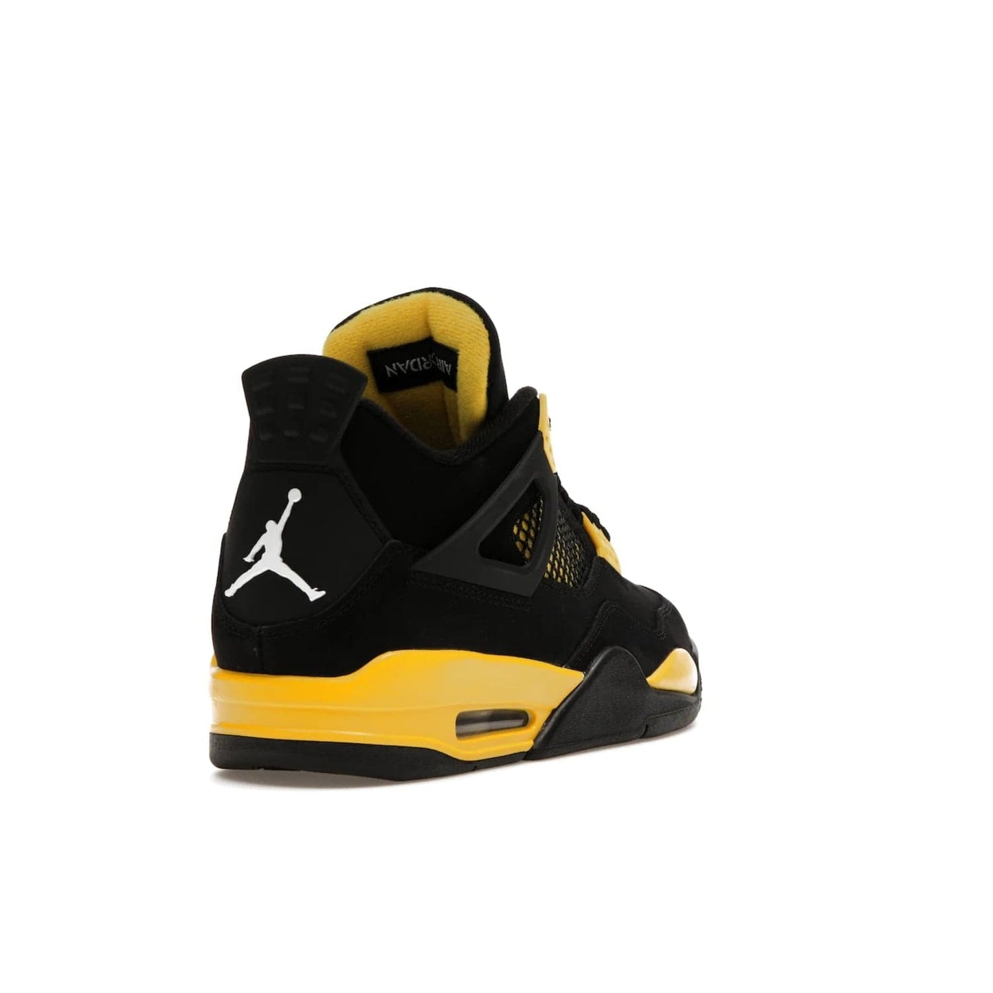 Jordan 4 Retro Thunder (2023) - Image 31 - Only at www.BallersClubKickz.com - Iconic Air Jordan 4 Retro Thunder (2023) returns with black nubuck upper and Tour Yellow details. Featuring Jumpman logo on heel tab, tongue and insoles. Dropping May 13th, 2023.