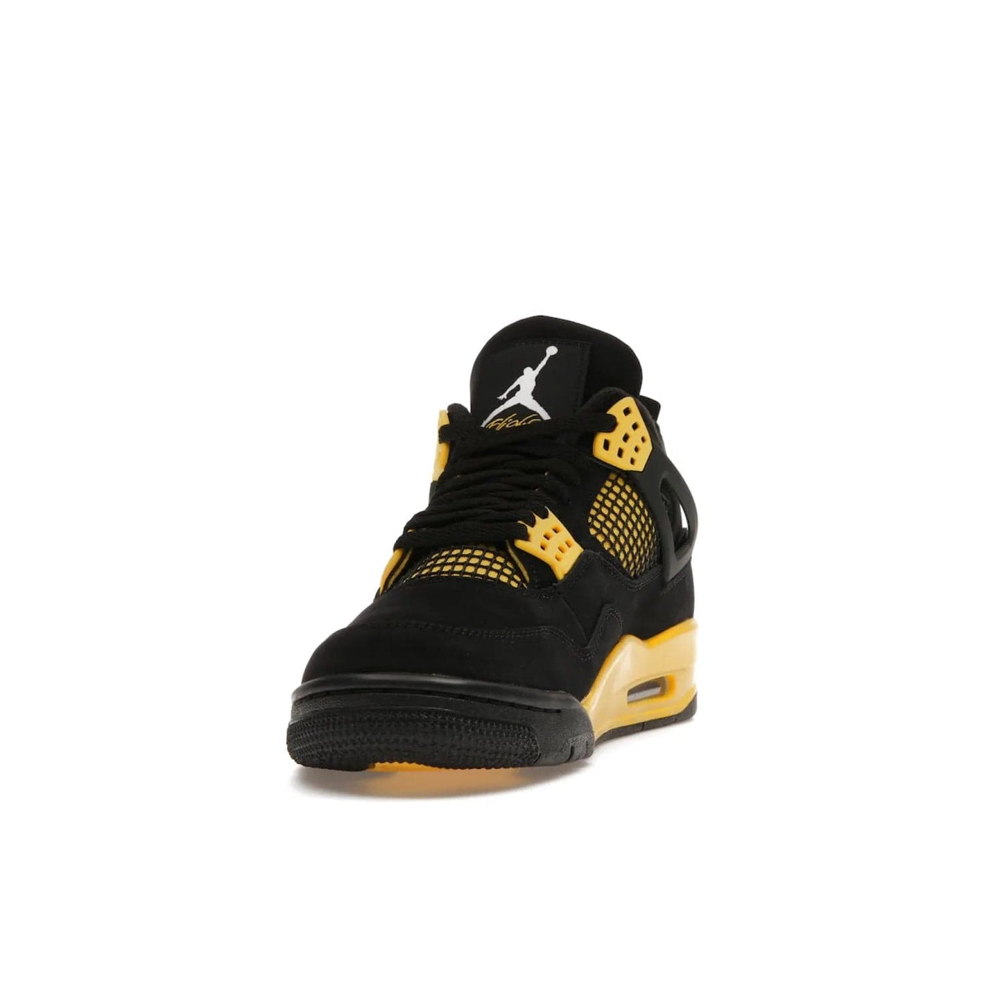 Jordan 4 Retro Thunder (2023) - Image 12 - Only at www.BallersClubKickz.com - Iconic Air Jordan 4 Retro Thunder (2023) returns with black nubuck upper and Tour Yellow details. Featuring Jumpman logo on heel tab, tongue and insoles. Dropping May 13th, 2023.