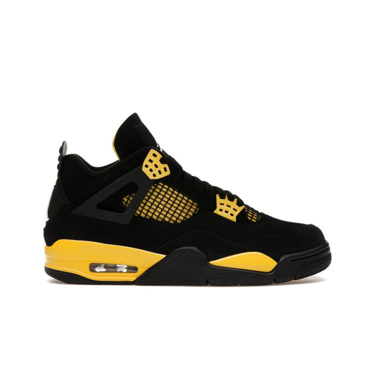 Jordan 4 Retro Thunder (2023) - Image 1 - Only at www.BallersClubKickz.com - Iconic Air Jordan 4 Retro Thunder (2023) returns with black nubuck upper and Tour Yellow details. Featuring Jumpman logo on heel tab, tongue and insoles. Dropping May 13th, 2023.