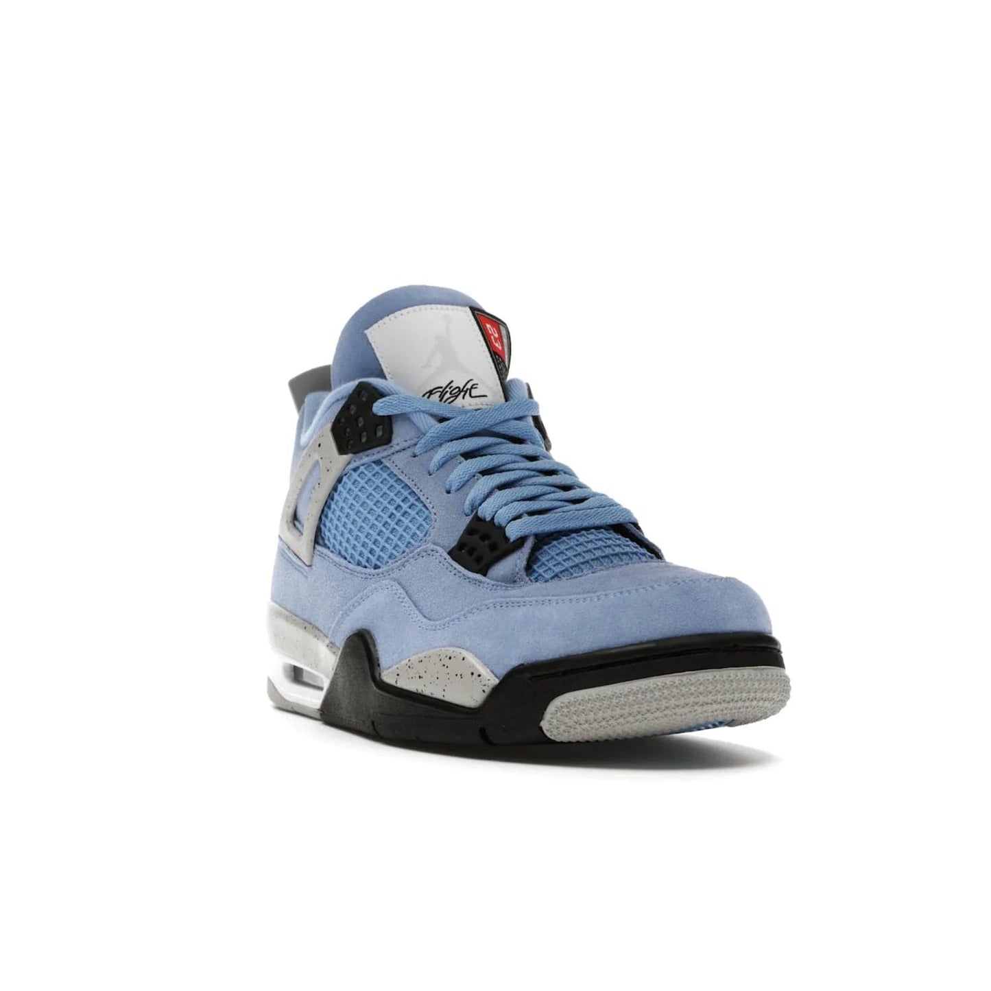 Jordan 4 Retro University Blue - Image 7 - Only at www.BallersClubKickz.com - The Air Jordan 4 University Blue honors MJ's alma mater. Rich University Blue suede, panels of netting, and Cement Grey speckled eyelets give this design an edgy look. Features a black, white and Tech Grey sole with a clear Air unit and two woven labels on the tongue. Jumpman logo & Team Jordan jock tag included. Released April 2021.