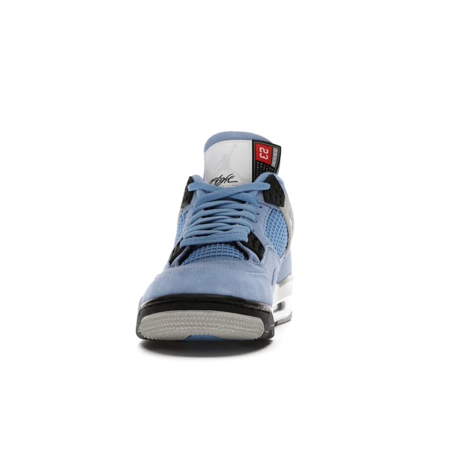 Jordan 4 Retro University Blue - Image 11 - Only at www.BallersClubKickz.com - The Air Jordan 4 University Blue honors MJ's alma mater. Rich University Blue suede, panels of netting, and Cement Grey speckled eyelets give this design an edgy look. Features a black, white and Tech Grey sole with a clear Air unit and two woven labels on the tongue. Jumpman logo & Team Jordan jock tag included. Released April 2021.