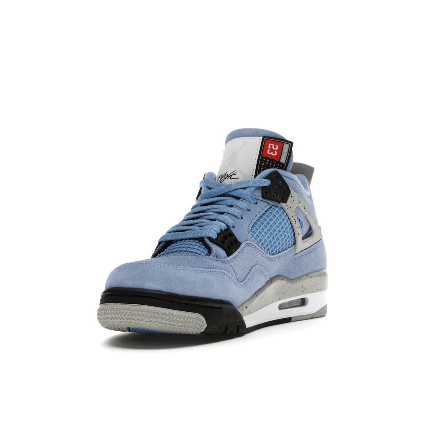 Jordan 4 Retro University Blue - Image 13 - Only at www.BallersClubKickz.com - The Air Jordan 4 University Blue honors MJ's alma mater. Rich University Blue suede, panels of netting, and Cement Grey speckled eyelets give this design an edgy look. Features a black, white and Tech Grey sole with a clear Air unit and two woven labels on the tongue. Jumpman logo & Team Jordan jock tag included. Released April 2021.