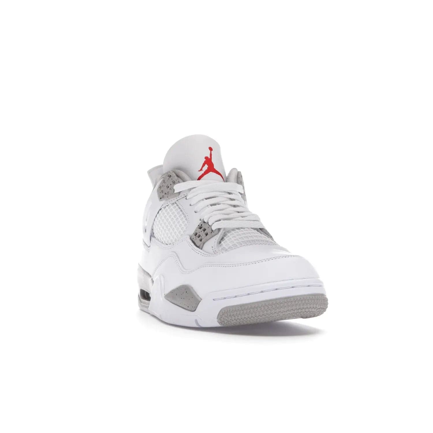 Jordan 4 Retro White Oreo (2021) - Image 8 - Only at www.BallersClubKickz.com - Update your sneaker style with the Air Jordan 4 Retro White Oreo. Limited-edition sneaker features white leather and mesh upper, Tech Grey eyelets and midsole, Jumpman logo embroidered on the tongue, and more. Released exclusively on Saturday, July 3rd.