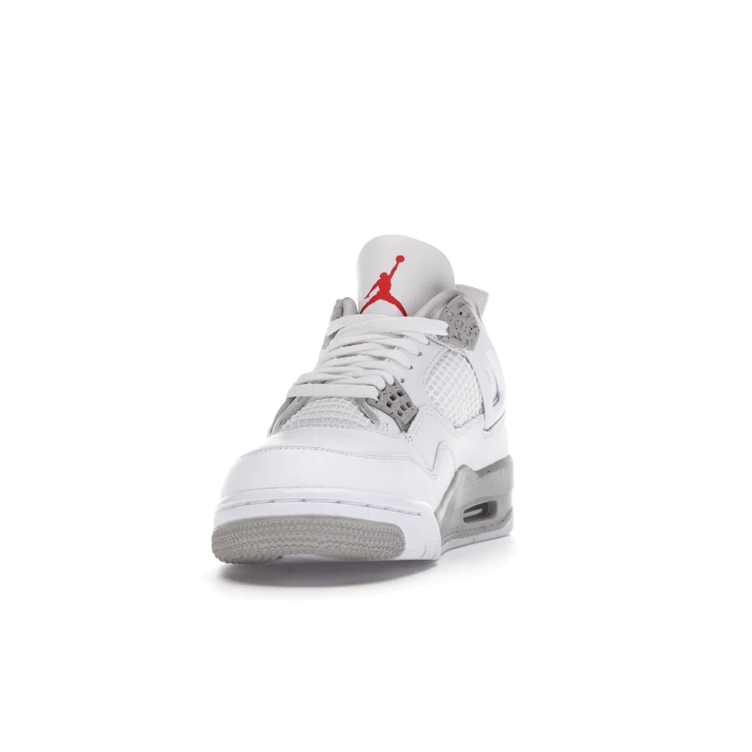 Jordan 4 Retro White Oreo (2021) - Image 12 - Only at www.BallersClubKickz.com - Update your sneaker style with the Air Jordan 4 Retro White Oreo. Limited-edition sneaker features white leather and mesh upper, Tech Grey eyelets and midsole, Jumpman logo embroidered on the tongue, and more. Released exclusively on Saturday, July 3rd.