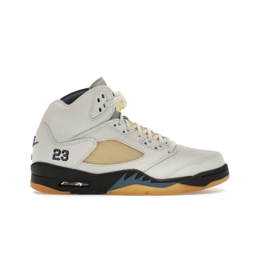 Jordan 5 Retro A Ma Maniére Dawn (Women's) - Image 1 - Only at www.BallersClubKickz.com - Catch the exclusive Air Jordan 5 Retro A Ma Maniére "Dawn" – a modern classic that combines elegance and street style. Get a gleaming metallic silver tongue, the iconic "23" heel, and signature shark teeth pattern. A Photon Dust/Black/Diffused Blue/Pale Ivory colorway, slimmed-down collar, and pre-yellowed quarter panel netting make this sneaker a must-have. Get your pair on November 17 and seize