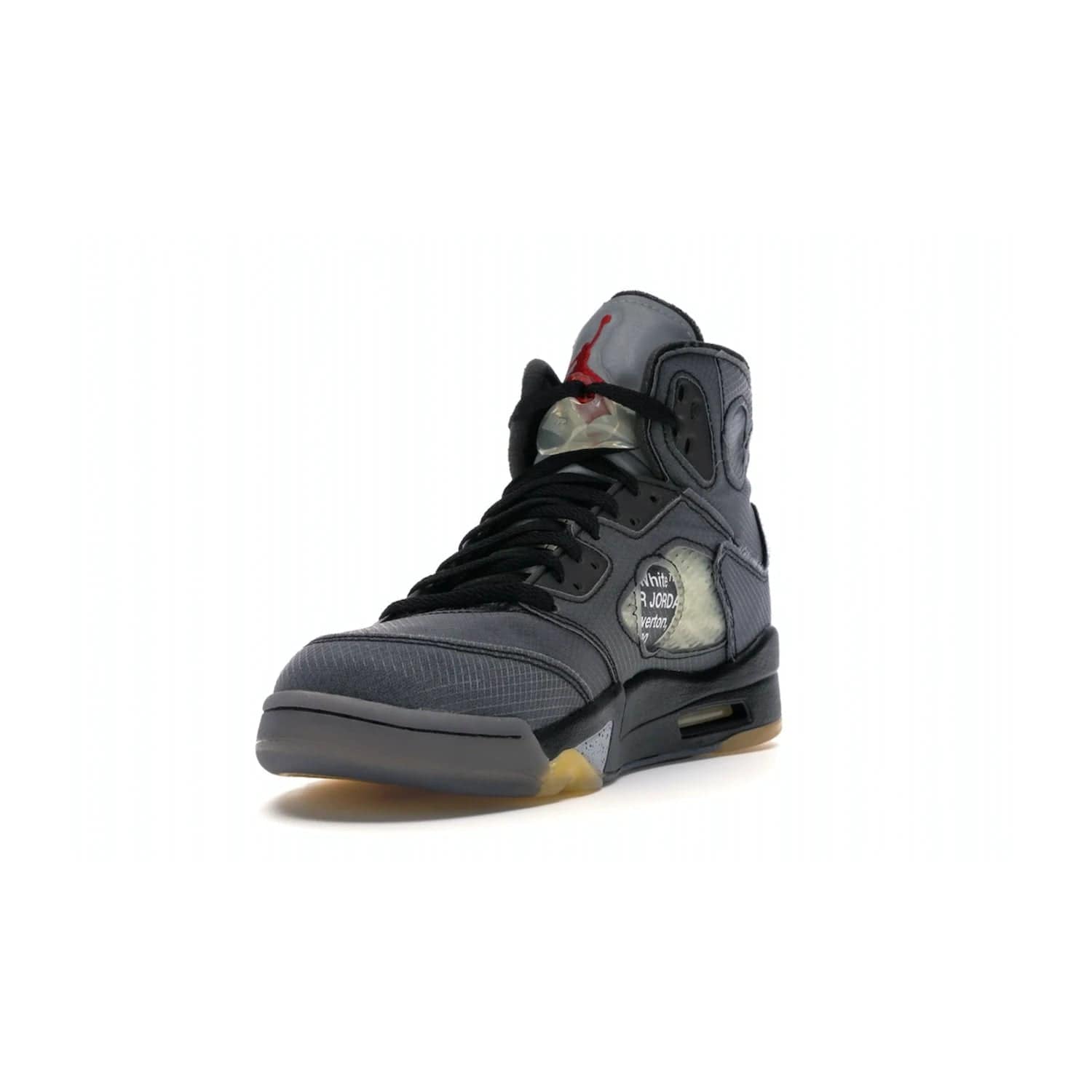 Jordan 5 Retro Off-White Muslin - Image 13 - Only at www.BallersClubKickz.com - Introducing the Jordan 5 Retro High Off-White Muslin, a modern re-imagining of a classic from Virgil Abloh. Featuring a black mesh upper, translucent net panels, window inserts, 3M reflective tongues and aged translucent outsole with fire red Jumpman detailing. Celebrating Nike Air technology, the Jordan 5 Retro released in Feb 2020.