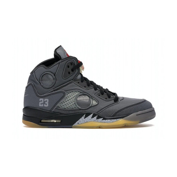 Jordan 5 Retro Off-White Muslin - Image 1 - Only at www.BallersClubKickz.com - Introducing the Jordan 5 Retro High Off-White Muslin, a modern re-imagining of a classic from Virgil Abloh. Featuring a black mesh upper, translucent net panels, window inserts, 3M reflective tongues and aged translucent outsole with fire red Jumpman detailing. Celebrating Nike Air technology, the Jordan 5 Retro released in Feb 2020.