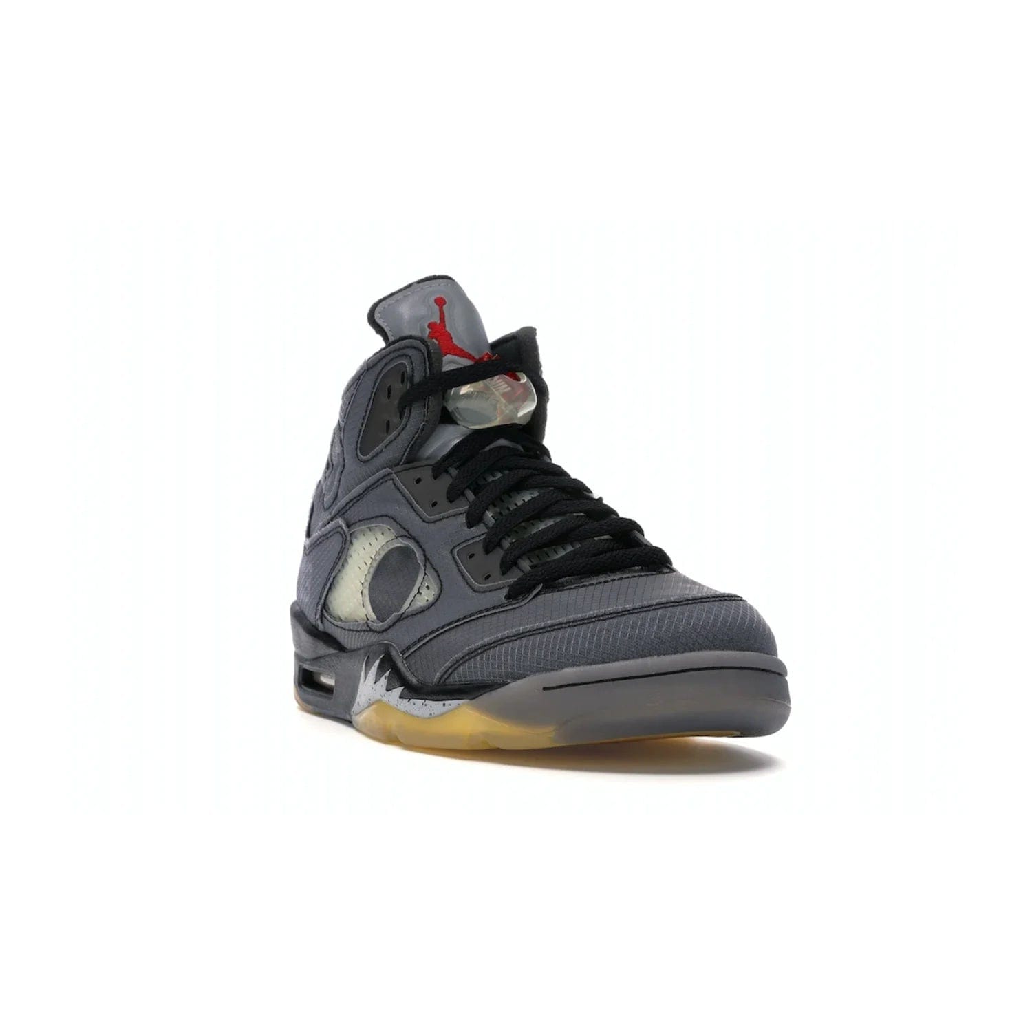 Jordan 5 Retro Off-White Muslin - Image 7 - Only at www.BallersClubKickz.com - Introducing the Jordan 5 Retro High Off-White Muslin, a modern re-imagining of a classic from Virgil Abloh. Featuring a black mesh upper, translucent net panels, window inserts, 3M reflective tongues and aged translucent outsole with fire red Jumpman detailing. Celebrating Nike Air technology, the Jordan 5 Retro released in Feb 2020.