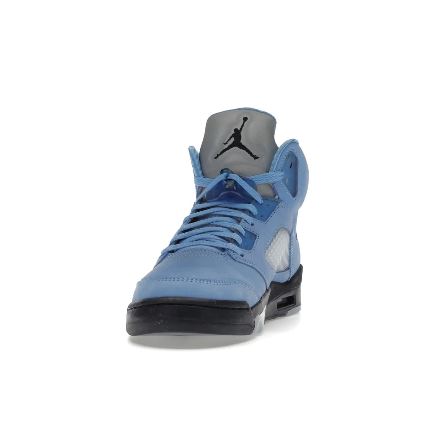 Jordan 5 Retro UNC University Blue - Image 12 - Only at www.BallersClubKickz.com - Fresh Air Jordan 5 Retro UNC University Blue in University Blue laces to honor Michael Jordan's alma mater. 3M reflective tongue, black Jumpman logo, contrasted by black midsole and translucent blue outsole. Drops March 5, 2023.