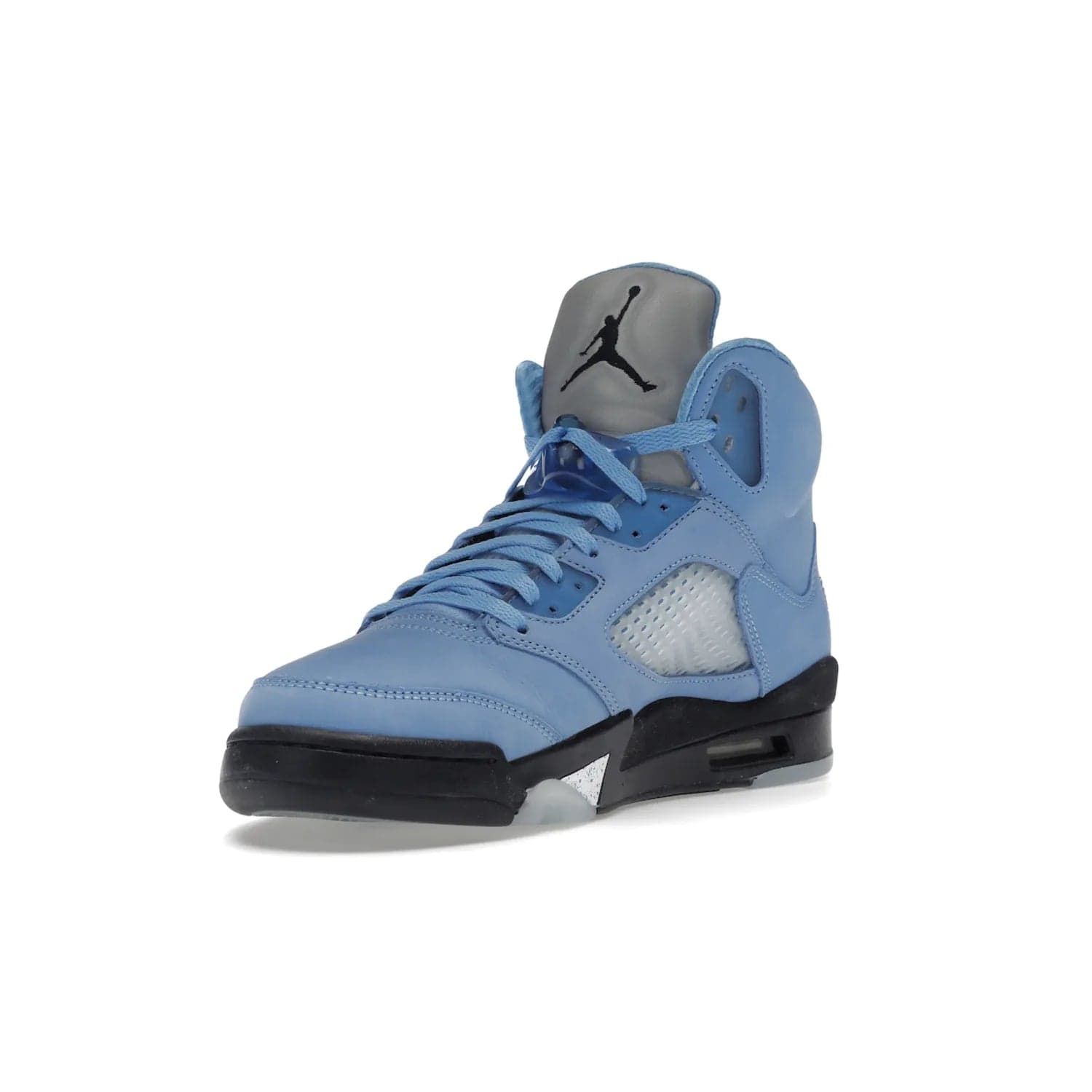 Jordan 5 Retro UNC University Blue - Image 14 - Only at www.BallersClubKickz.com - Fresh Air Jordan 5 Retro UNC University Blue in University Blue laces to honor Michael Jordan's alma mater. 3M reflective tongue, black Jumpman logo, contrasted by black midsole and translucent blue outsole. Drops March 5, 2023.