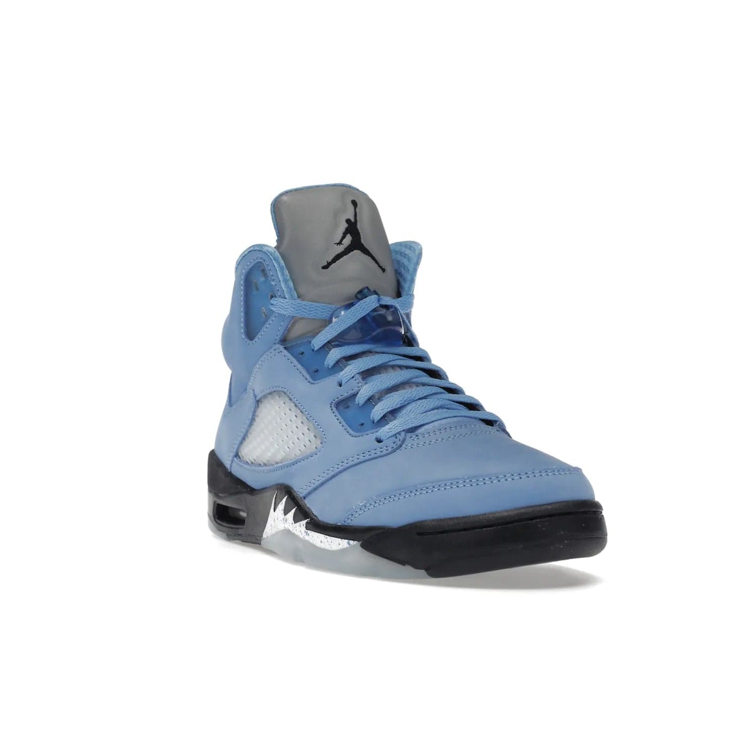 Jordan 5 Retro UNC University Blue - Image 7 - Only at www.BallersClubKickz.com - Fresh Air Jordan 5 Retro UNC University Blue in University Blue laces to honor Michael Jordan's alma mater. 3M reflective tongue, black Jumpman logo, contrasted by black midsole and translucent blue outsole. Drops March 5, 2023.