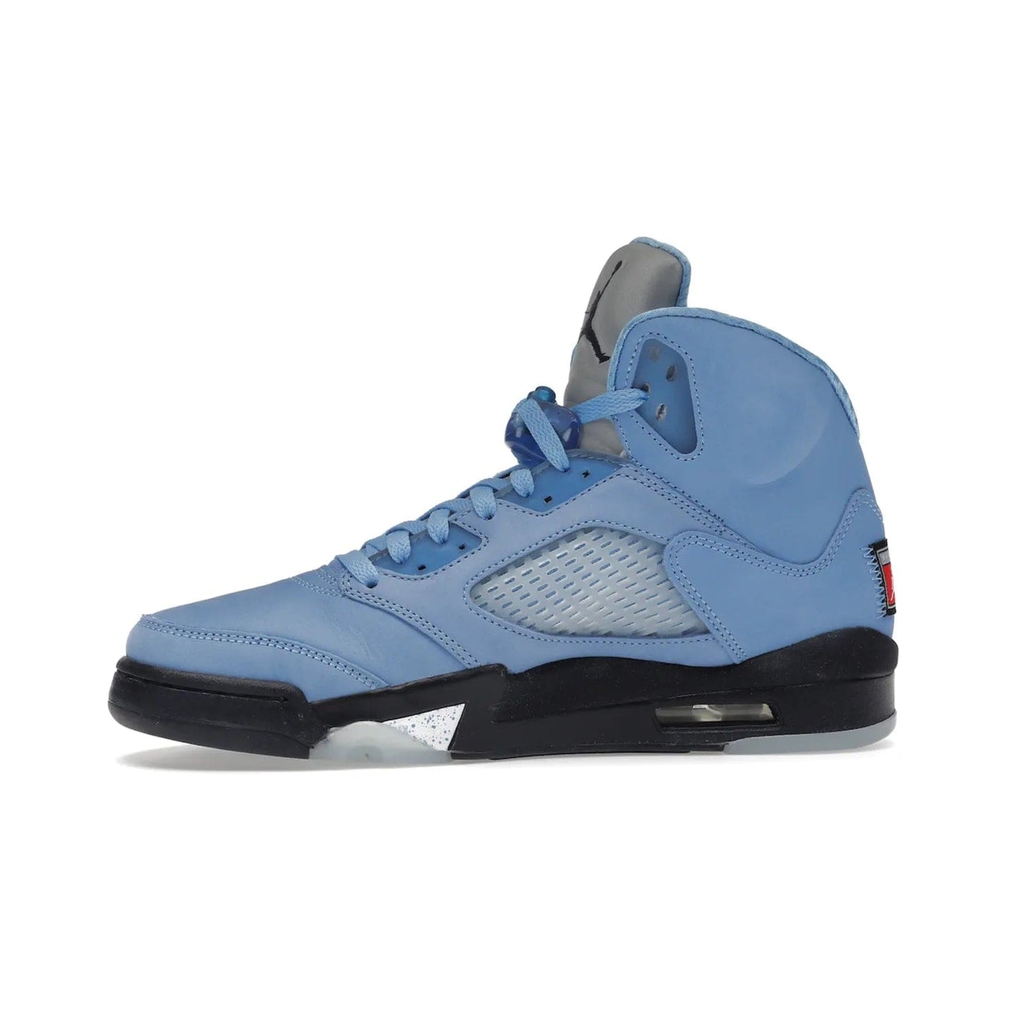 Jordan 5 Retro UNC University Blue - Image 18 - Only at www.BallersClubKickz.com - Fresh Air Jordan 5 Retro UNC University Blue in University Blue laces to honor Michael Jordan's alma mater. 3M reflective tongue, black Jumpman logo, contrasted by black midsole and translucent blue outsole. Drops March 5, 2023.