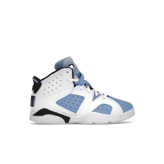 Jordan 6 Retro UNC White (PS) - Image 1 - Only at www.BallersClubKickz.com - The Air Jordan 6 Retro UNC White PS celebrates Michael Jordan's alma mater, the University of North Carolina. It features a classic color-blocking of the iconic Jordan 6 Carmine and a stitched Jordan Team patch. This must-have sneaker released on April 27th, 2022. Referencing the university colors, get this shoe for a stylish and timeless style with university pride.