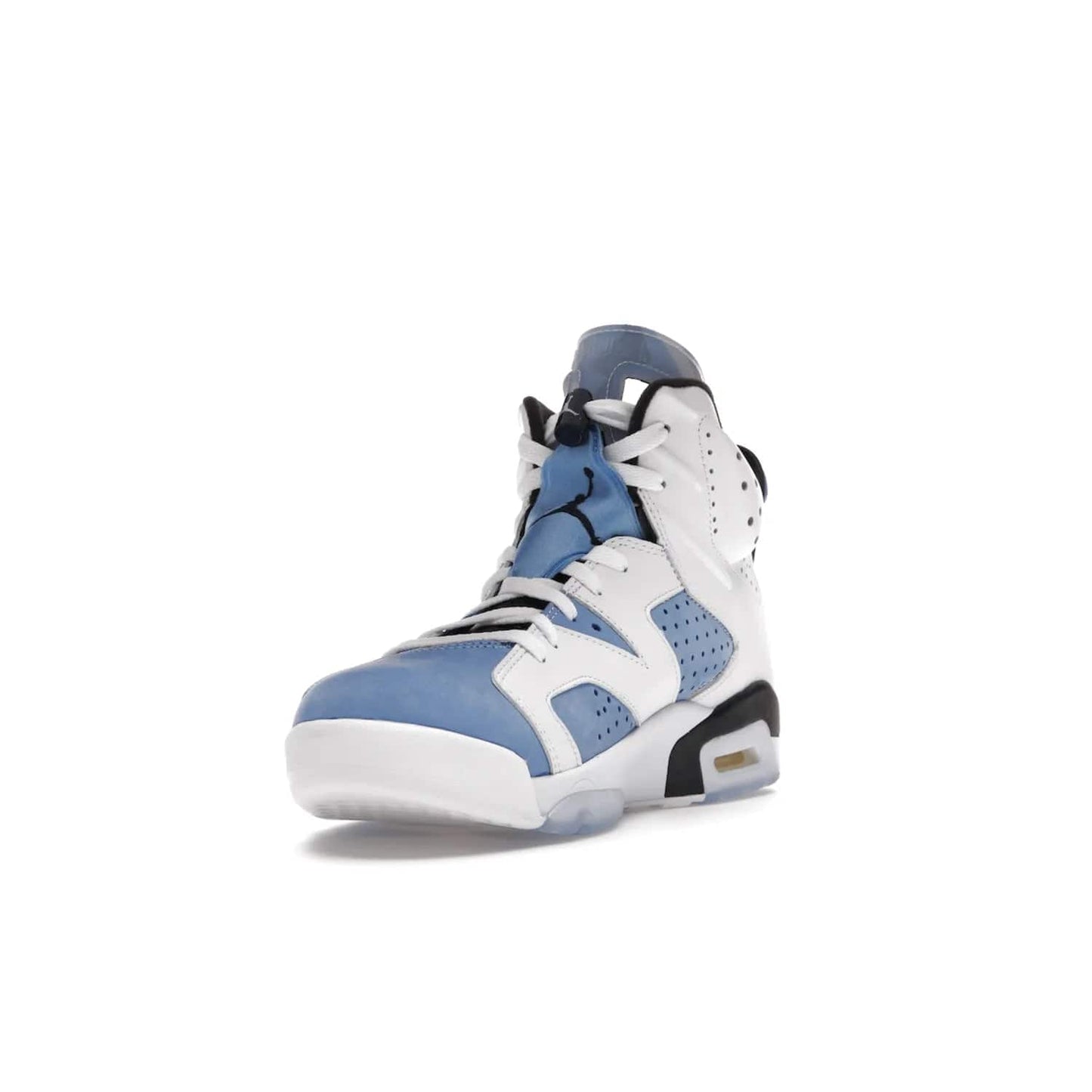 Jordan 6 Retro UNC White - Image 13 - Only at www.BallersClubKickz.com - Air Jordan 6 Retro UNC White with classic UNC colors brings nostalgia and style to a legendary silhouette. Celebrate MJ's alma mater with navy blue accents, icy semi-translucent sole and Jordan Team patch. Out March 2022 for the Sneaker Enthusiast.