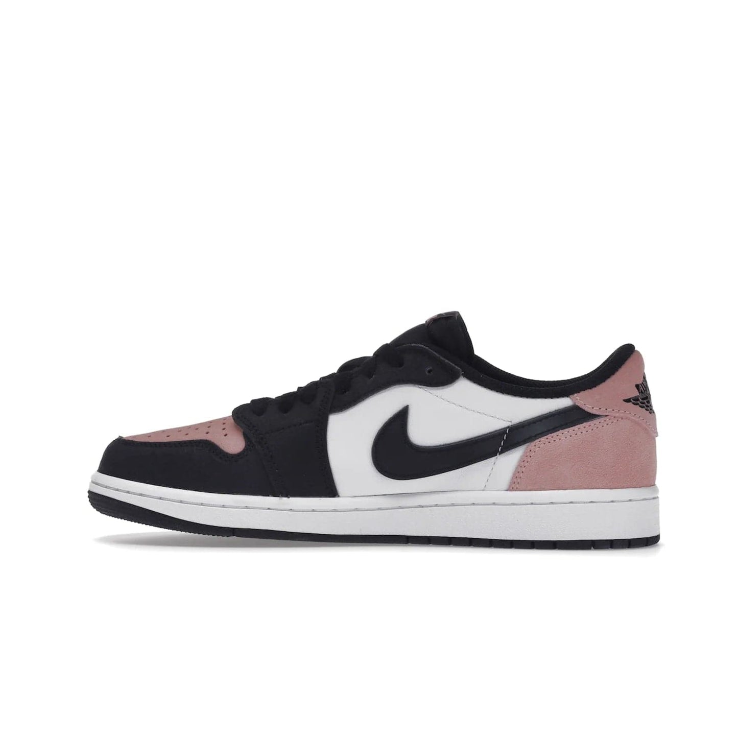 Jordan 1 Low OG Bleached Coral - Image 20 - Only at www.BallersClubKickz.com - Introducing the Air Jordan 1 Low OG Bleached Coral. Constructed with white leather, black cracked leather & Bleached Coral suede. Signature Jordan Wings logo, white Air sole. Get the pack in July 2022 and stand out.