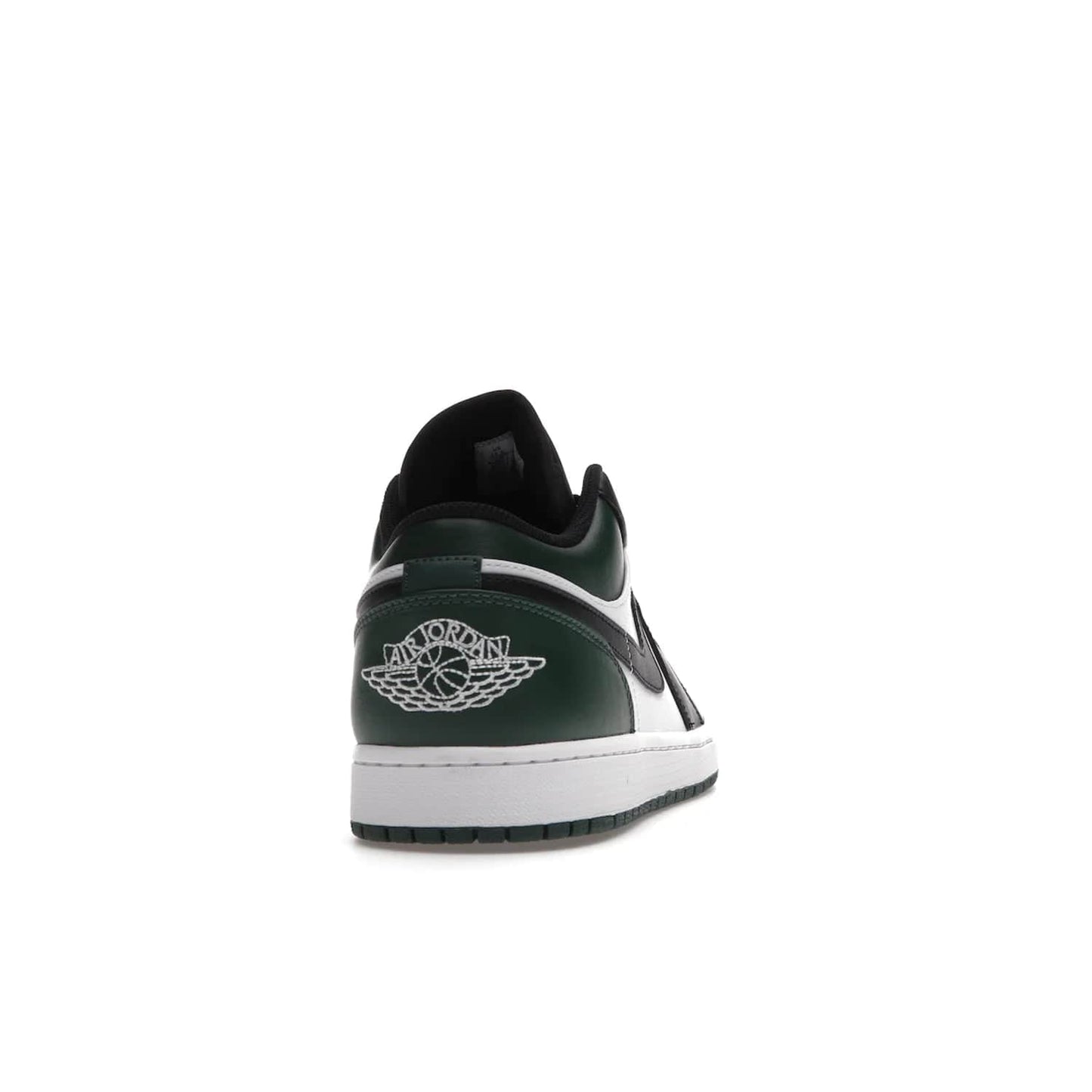 Jordan 1 Low Green Toe - Image 29 - Only at www.BallersClubKickz.com - The Jordan 1 Low Green Toe features white, black and Noble Green leather with black Swoosh. Get the classic Bred Toe-inspired color blocking with green perforated toe box. White and green Air sole completes the design. Released in October 2021 at only $100. Grab your pair now!