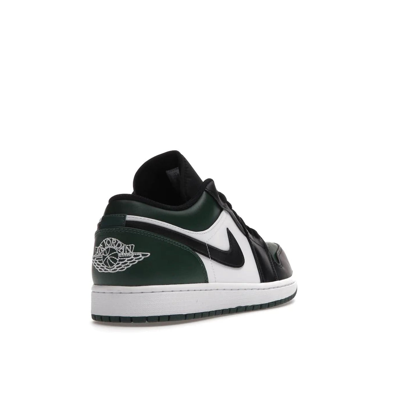 Jordan 1 Low Green Toe - Image 31 - Only at www.BallersClubKickz.com - The Jordan 1 Low Green Toe features white, black and Noble Green leather with black Swoosh. Get the classic Bred Toe-inspired color blocking with green perforated toe box. White and green Air sole completes the design. Released in October 2021 at only $100. Grab your pair now!