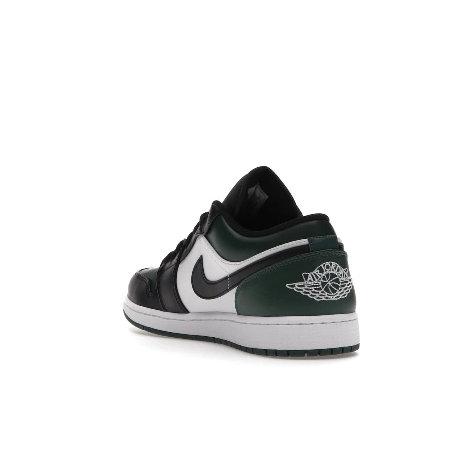 Jordan 1 Low Green Toe - Image 25 - Only at www.BallersClubKickz.com - The Jordan 1 Low Green Toe features white, black and Noble Green leather with black Swoosh. Get the classic Bred Toe-inspired color blocking with green perforated toe box. White and green Air sole completes the design. Released in October 2021 at only $100. Grab your pair now!