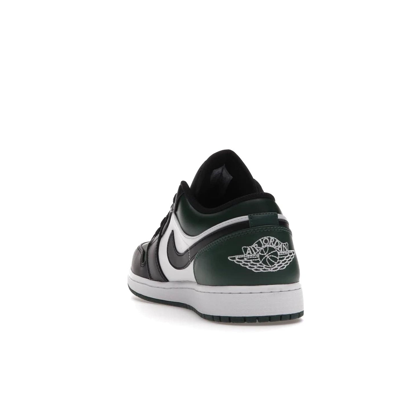Jordan 1 Low Green Toe - Image 26 - Only at www.BallersClubKickz.com - The Jordan 1 Low Green Toe features white, black and Noble Green leather with black Swoosh. Get the classic Bred Toe-inspired color blocking with green perforated toe box. White and green Air sole completes the design. Released in October 2021 at only $100. Grab your pair now!