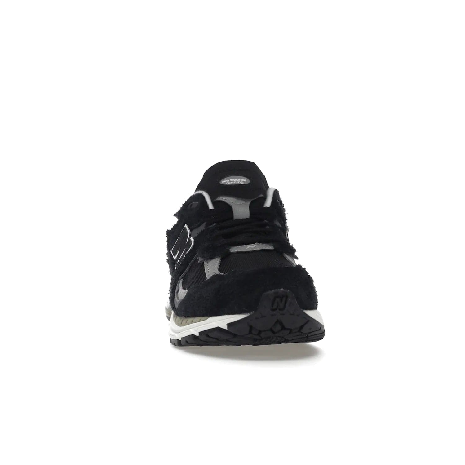 New Balance 2002R Protection Pack Black Grey - Image 9 - Only at www.BallersClubKickz.com - Look stylish in the New Balance 2002R Protection Pack Black Grey. Uppers constructed from premium materials like mesh and synthetic overlays. Iconic "N" emblem appears in white and black. ABZORB midsole for shock absorption and responsiveness. Black outsole for grip and traction. Lacing system offers customized fit and cushioned tongue and collar offer comfort and stability. Step up your style with this must-have