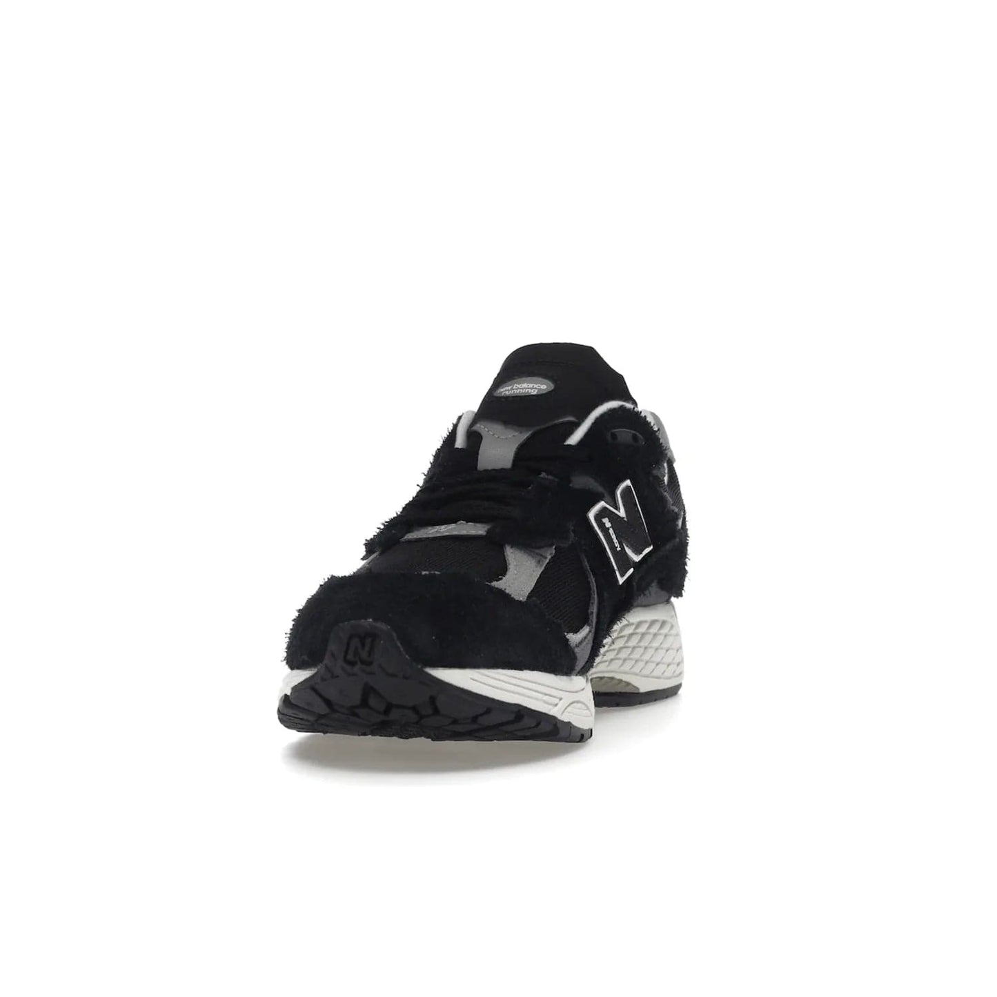 New Balance 2002R Protection Pack Black Grey - Image 12 - Only at www.BallersClubKickz.com - Look stylish in the New Balance 2002R Protection Pack Black Grey. Uppers constructed from premium materials like mesh and synthetic overlays. Iconic "N" emblem appears in white and black. ABZORB midsole for shock absorption and responsiveness. Black outsole for grip and traction. Lacing system offers customized fit and cushioned tongue and collar offer comfort and stability. Step up your style with this must-hav