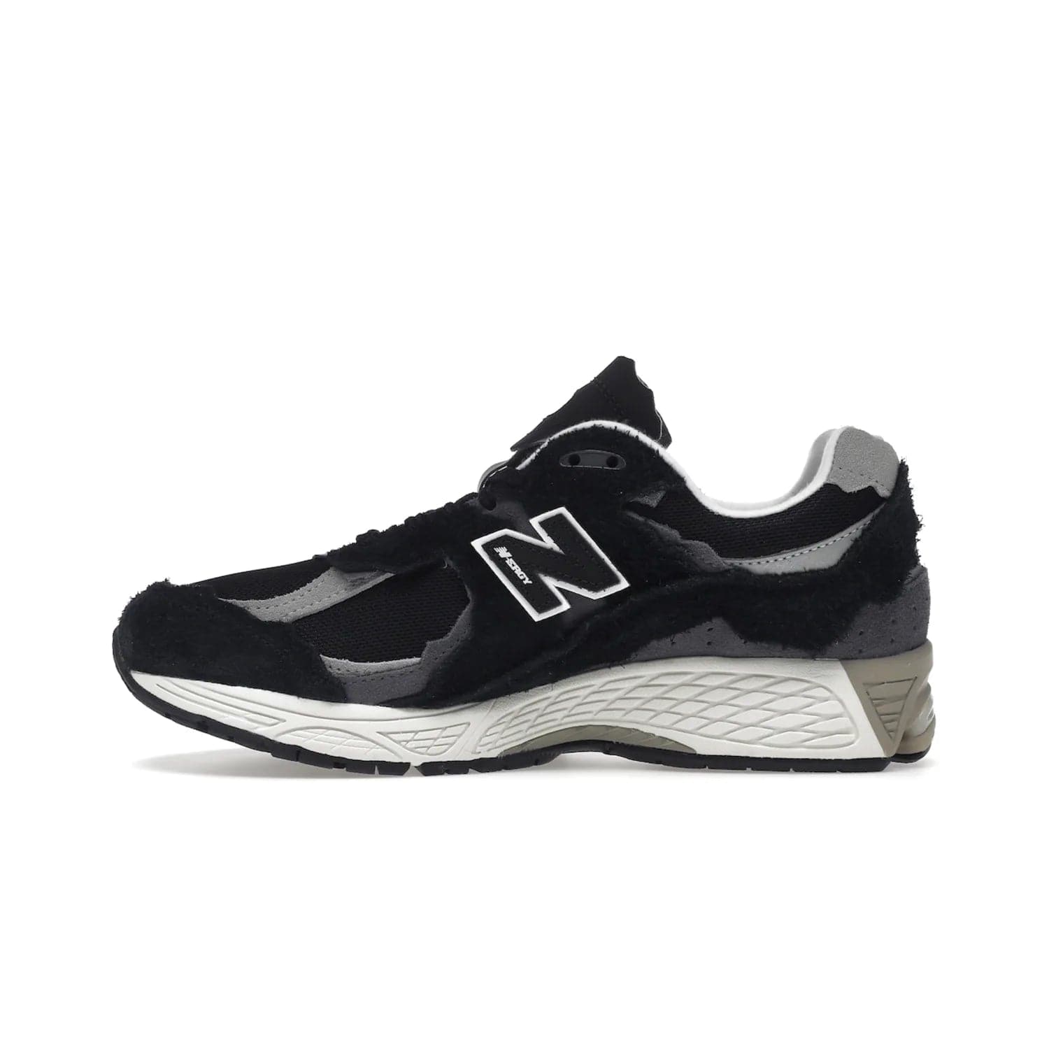 New Balance 2002R Protection Pack Black Grey - Image 19 - Only at www.BallersClubKickz.com - Look stylish in the New Balance 2002R Protection Pack Black Grey. Uppers constructed from premium materials like mesh and synthetic overlays. Iconic "N" emblem appears in white and black. ABZORB midsole for shock absorption and responsiveness. Black outsole for grip and traction. Lacing system offers customized fit and cushioned tongue and collar offer comfort and stability. Step up your style with this must-hav