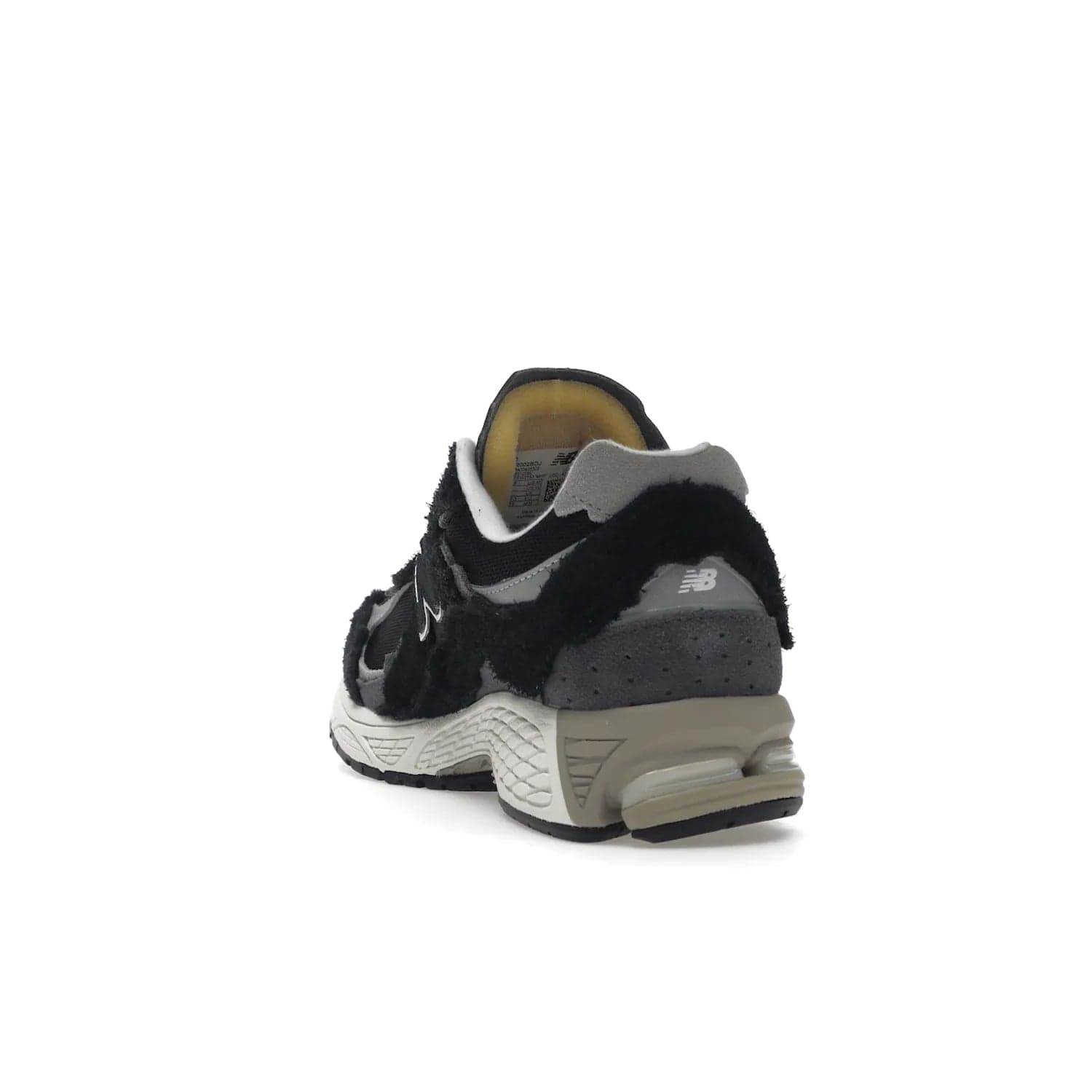 New Balance 2002R Protection Pack Black Grey - Image 26 - Only at www.BallersClubKickz.com - Look stylish in the New Balance 2002R Protection Pack Black Grey. Uppers constructed from premium materials like mesh and synthetic overlays. Iconic "N" emblem appears in white and black. ABZORB midsole for shock absorption and responsiveness. Black outsole for grip and traction. Lacing system offers customized fit and cushioned tongue and collar offer comfort and stability. Step up your style with this must-hav