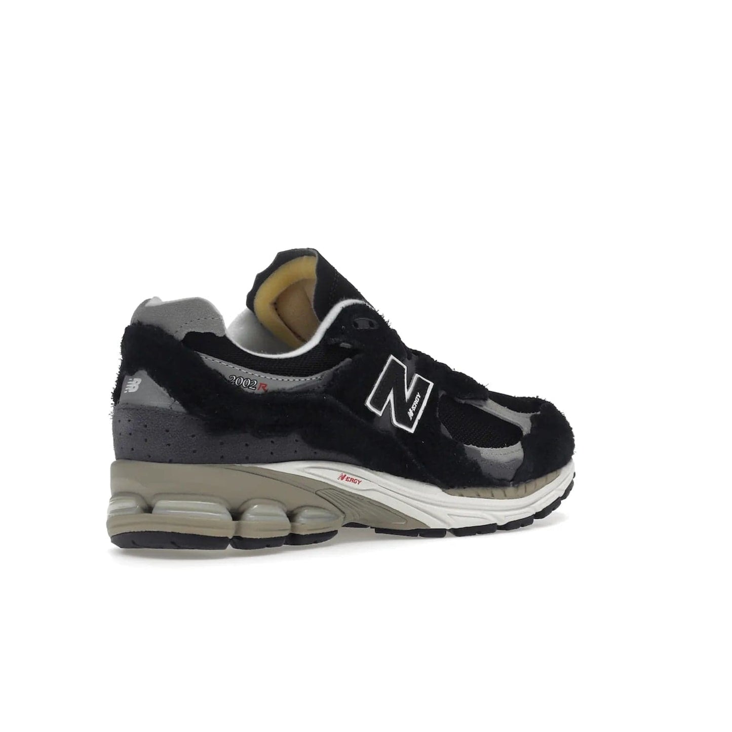 New Balance 2002R Protection Pack Black Grey - Image 33 - Only at www.BallersClubKickz.com - Look stylish in the New Balance 2002R Protection Pack Black Grey. Uppers constructed from premium materials like mesh and synthetic overlays. Iconic "N" emblem appears in white and black. ABZORB midsole for shock absorption and responsiveness. Black outsole for grip and traction. Lacing system offers customized fit and cushioned tongue and collar offer comfort and stability. Step up your style with this must-hav