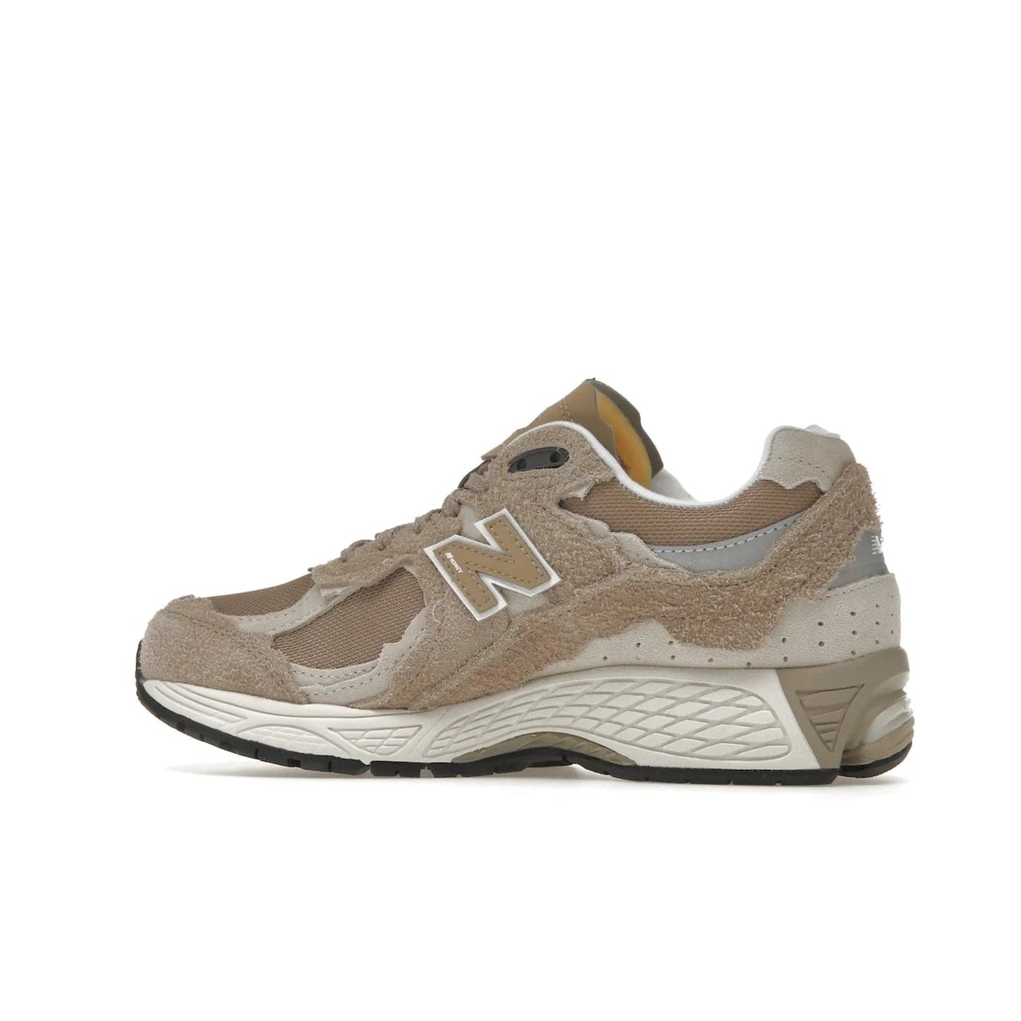 New Balance 2002R Protection Pack Driftwood - Image 21 - Only at www.BallersClubKickz.com - The New Balance 2002R Driftwood Protection Pack is a fashionable yet comfortable sneaker perfect for any occasion. Features include hairy suede uppers, breathable mesh, underfoot support, 3M reflective details, and more. Stylishly dress up your look with this shoe, available March 2023.