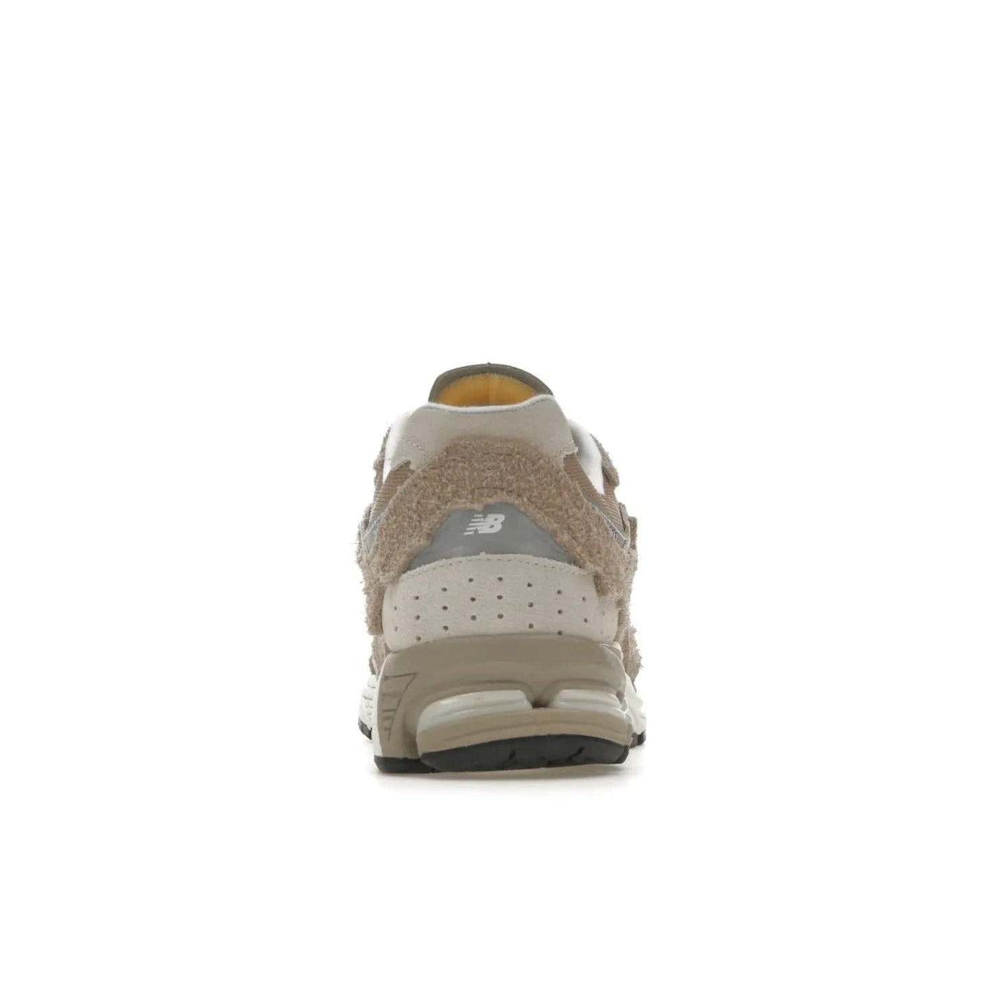 New Balance 2002R Protection Pack Driftwood - Image 28 - Only at www.BallersClubKickz.com - The New Balance 2002R Driftwood Protection Pack is a fashionable yet comfortable sneaker perfect for any occasion. Features include hairy suede uppers, breathable mesh, underfoot support, 3M reflective details, and more. Stylishly dress up your look with this shoe, available March 2023.