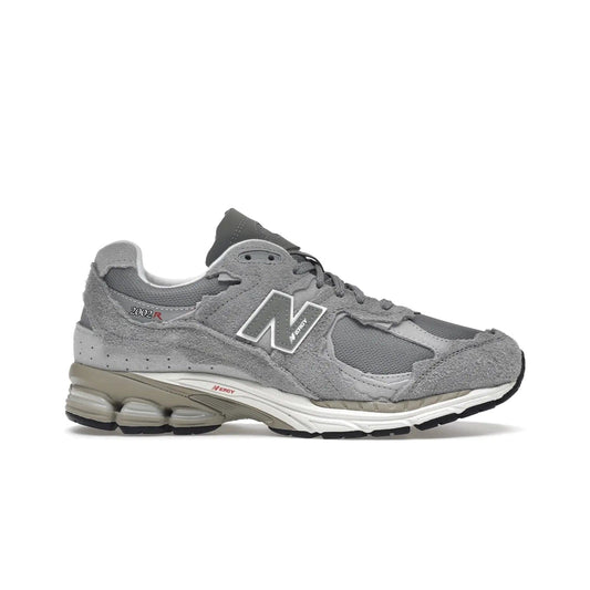 New Balance 2002R Protection Pack Grey - Image 1 - Only at www.BallersClubKickz.com - The New Balance 2002R Protection Pack Grey provides superior protection and all-day comfort. It features a blend of synthetic and mesh materials, foam midsole, rubber outsole, and a toe cap and heel counter. Show off the classic "N" logo and "2002R" lettering. Get a pair on February 14, 2023 for protection and style.