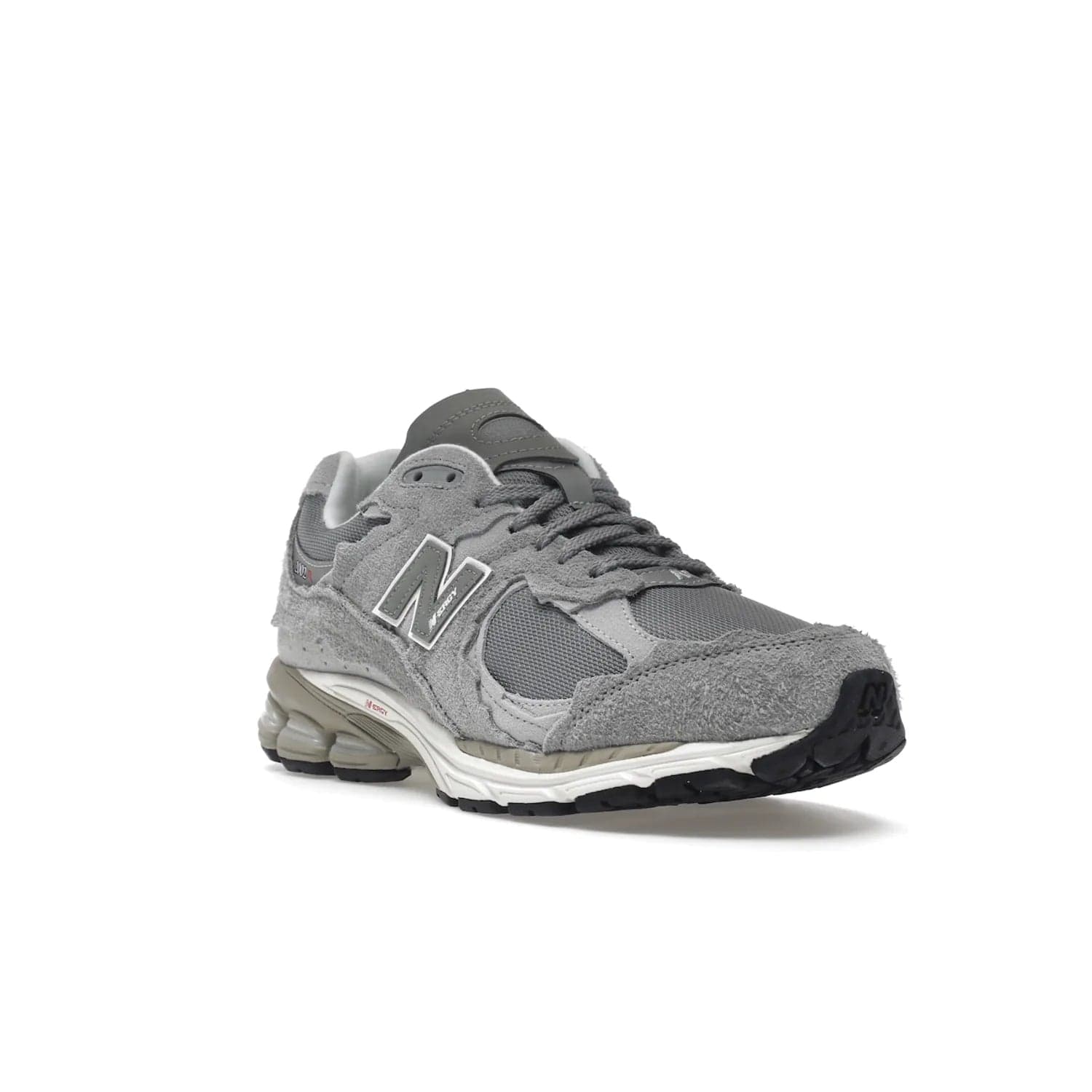 New Balance 2002R Protection Pack Grey - Image 6 - Only at www.BallersClubKickz.com - The New Balance 2002R Protection Pack Grey provides superior protection and all-day comfort. It features a blend of synthetic and mesh materials, foam midsole, rubber outsole, and a toe cap and heel counter. Show off the classic "N" logo and "2002R" lettering. Get a pair on February 14, 2023 for protection and style.