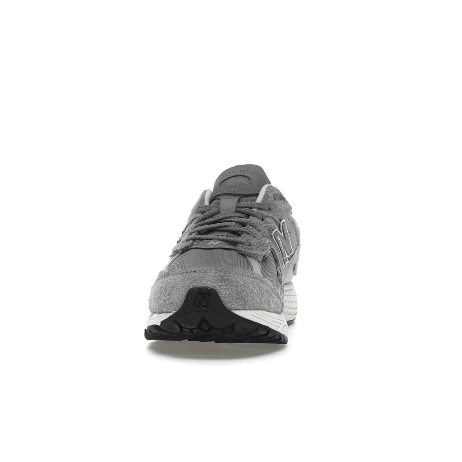 New Balance 2002R Protection Pack Grey - Image 11 - Only at www.BallersClubKickz.com - The New Balance 2002R Protection Pack Grey provides superior protection and all-day comfort. It features a blend of synthetic and mesh materials, foam midsole, rubber outsole, and a toe cap and heel counter. Show off the classic "N" logo and "2002R" lettering. Get a pair on February 14, 2023 for protection and style.
