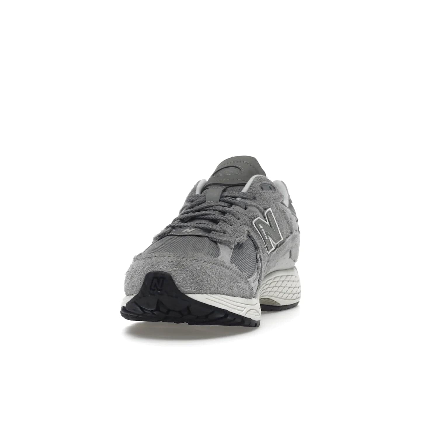 New Balance 2002R Protection Pack Grey - Image 12 - Only at www.BallersClubKickz.com - The New Balance 2002R Protection Pack Grey provides superior protection and all-day comfort. It features a blend of synthetic and mesh materials, foam midsole, rubber outsole, and a toe cap and heel counter. Show off the classic "N" logo and "2002R" lettering. Get a pair on February 14, 2023 for protection and style.