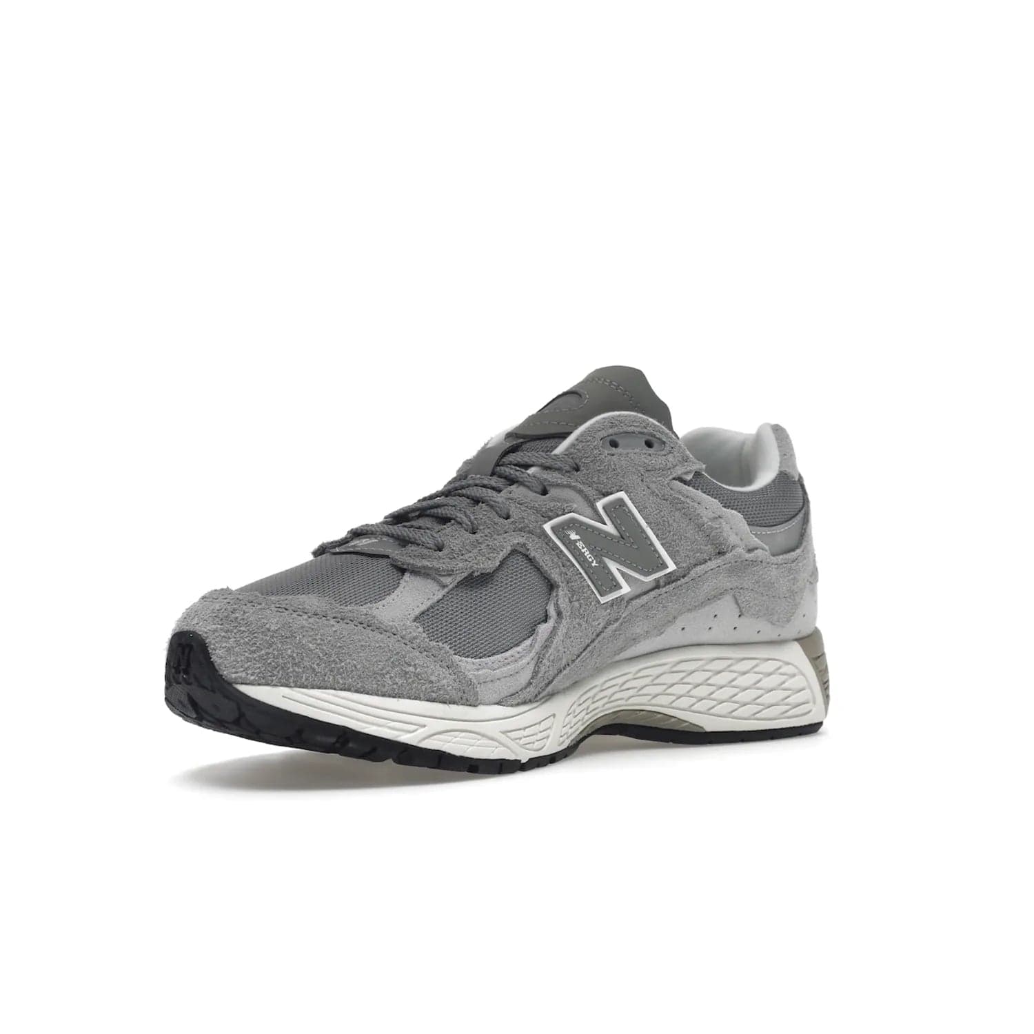 New Balance 2002R Protection Pack Grey - Image 15 - Only at www.BallersClubKickz.com - The New Balance 2002R Protection Pack Grey provides superior protection and all-day comfort. It features a blend of synthetic and mesh materials, foam midsole, rubber outsole, and a toe cap and heel counter. Show off the classic "N" logo and "2002R" lettering. Get a pair on February 14, 2023 for protection and style.