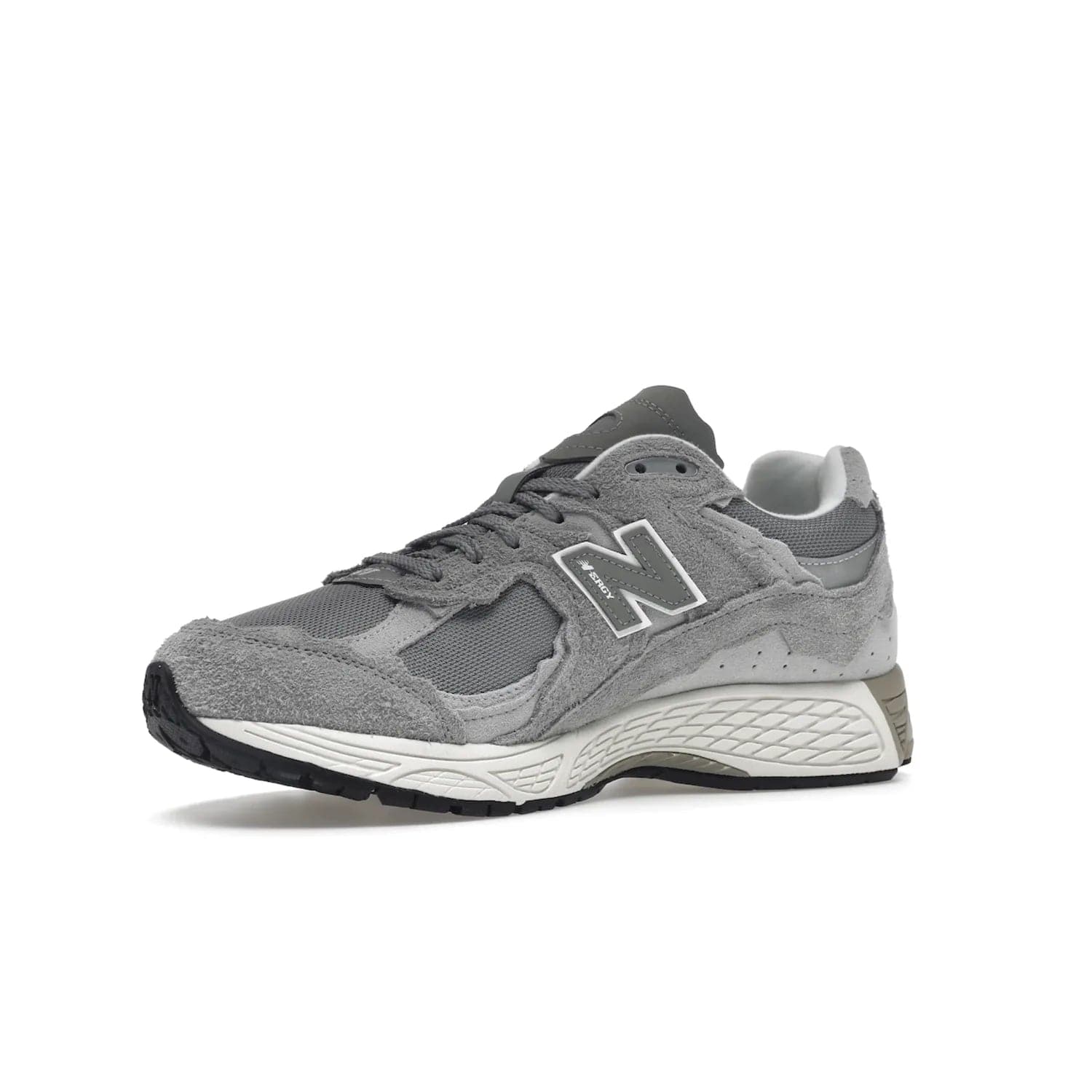 New Balance 2002R Protection Pack Grey - Image 16 - Only at www.BallersClubKickz.com - The New Balance 2002R Protection Pack Grey provides superior protection and all-day comfort. It features a blend of synthetic and mesh materials, foam midsole, rubber outsole, and a toe cap and heel counter. Show off the classic "N" logo and "2002R" lettering. Get a pair on February 14, 2023 for protection and style.