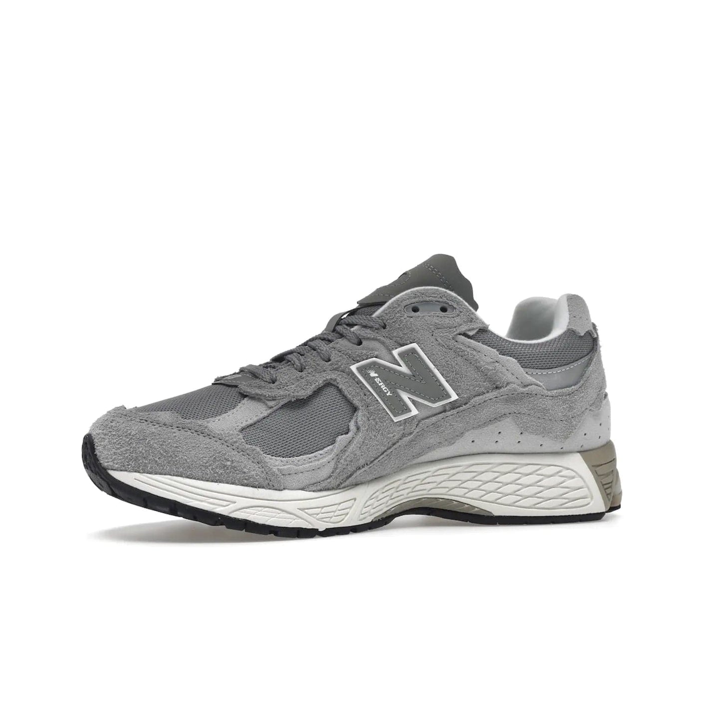 New Balance 2002R Protection Pack Grey - Image 17 - Only at www.BallersClubKickz.com - The New Balance 2002R Protection Pack Grey provides superior protection and all-day comfort. It features a blend of synthetic and mesh materials, foam midsole, rubber outsole, and a toe cap and heel counter. Show off the classic "N" logo and "2002R" lettering. Get a pair on February 14, 2023 for protection and style.