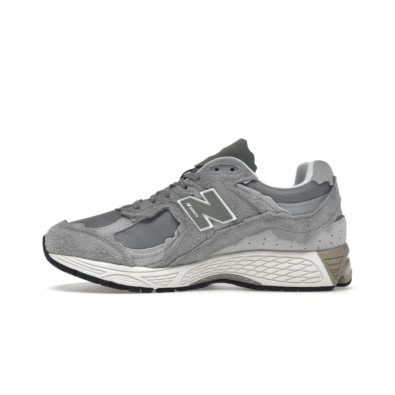New Balance 2002R Protection Pack Grey - Image 19 - Only at www.BallersClubKickz.com - The New Balance 2002R Protection Pack Grey provides superior protection and all-day comfort. It features a blend of synthetic and mesh materials, foam midsole, rubber outsole, and a toe cap and heel counter. Show off the classic "N" logo and "2002R" lettering. Get a pair on February 14, 2023 for protection and style.