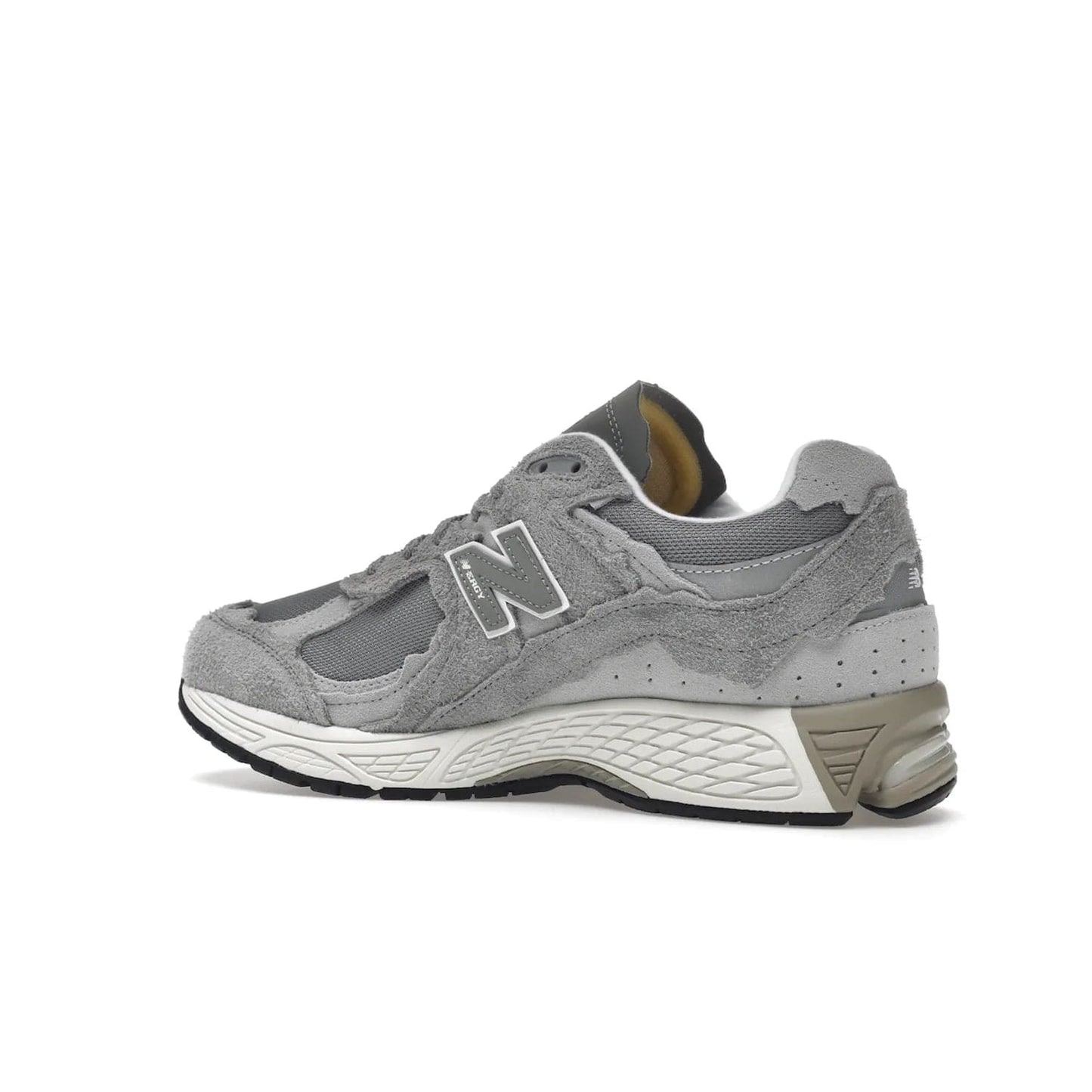 New Balance 2002R Protection Pack Grey - Image 22 - Only at www.BallersClubKickz.com - The New Balance 2002R Protection Pack Grey provides superior protection and all-day comfort. It features a blend of synthetic and mesh materials, foam midsole, rubber outsole, and a toe cap and heel counter. Show off the classic "N" logo and "2002R" lettering. Get a pair on February 14, 2023 for protection and style.