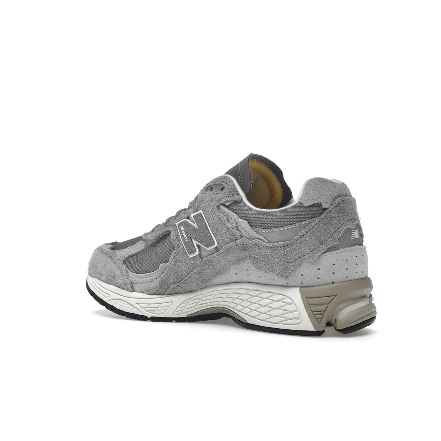 New Balance 2002R Protection Pack Grey - Image 23 - Only at www.BallersClubKickz.com - The New Balance 2002R Protection Pack Grey provides superior protection and all-day comfort. It features a blend of synthetic and mesh materials, foam midsole, rubber outsole, and a toe cap and heel counter. Show off the classic "N" logo and "2002R" lettering. Get a pair on February 14, 2023 for protection and style.