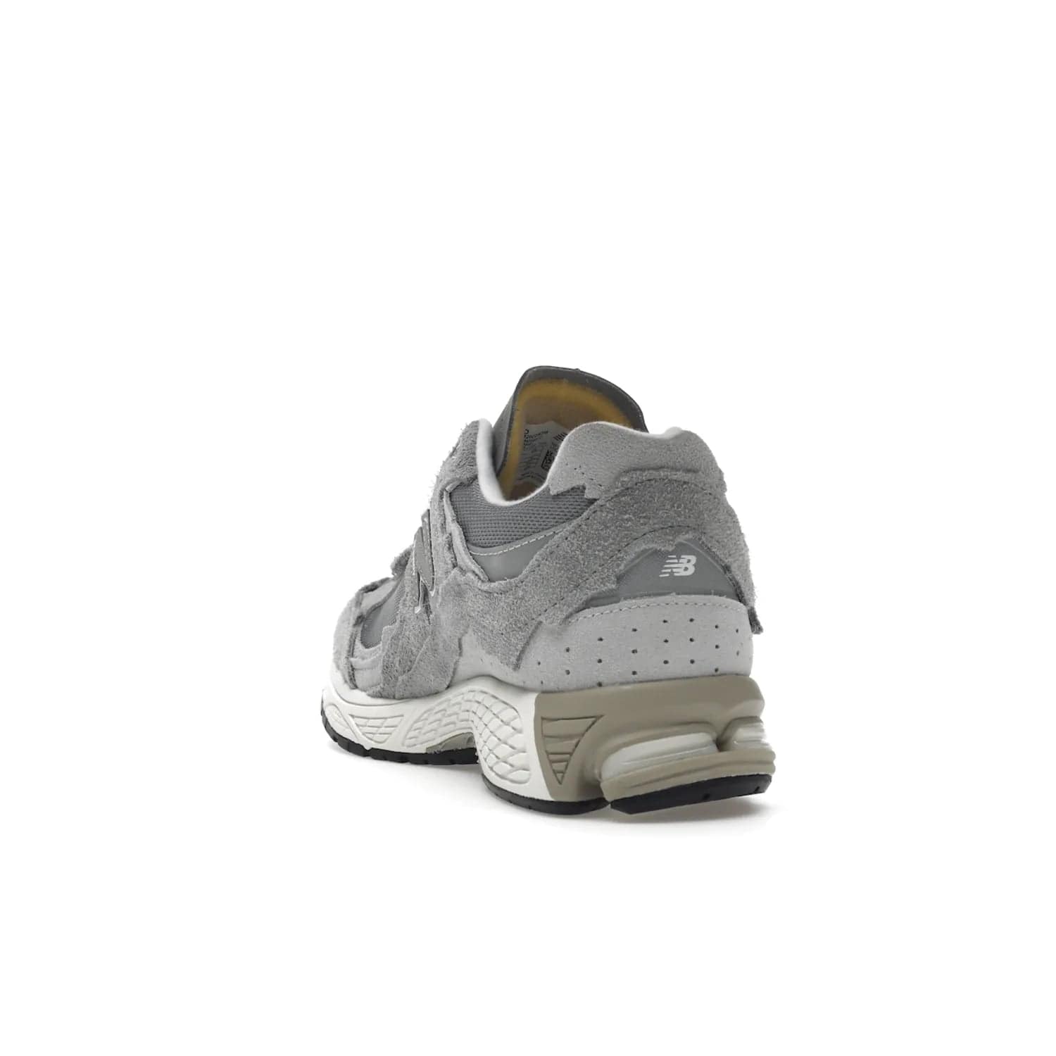 New Balance 2002R Protection Pack Grey - Image 26 - Only at www.BallersClubKickz.com - The New Balance 2002R Protection Pack Grey provides superior protection and all-day comfort. It features a blend of synthetic and mesh materials, foam midsole, rubber outsole, and a toe cap and heel counter. Show off the classic "N" logo and "2002R" lettering. Get a pair on February 14, 2023 for protection and style.