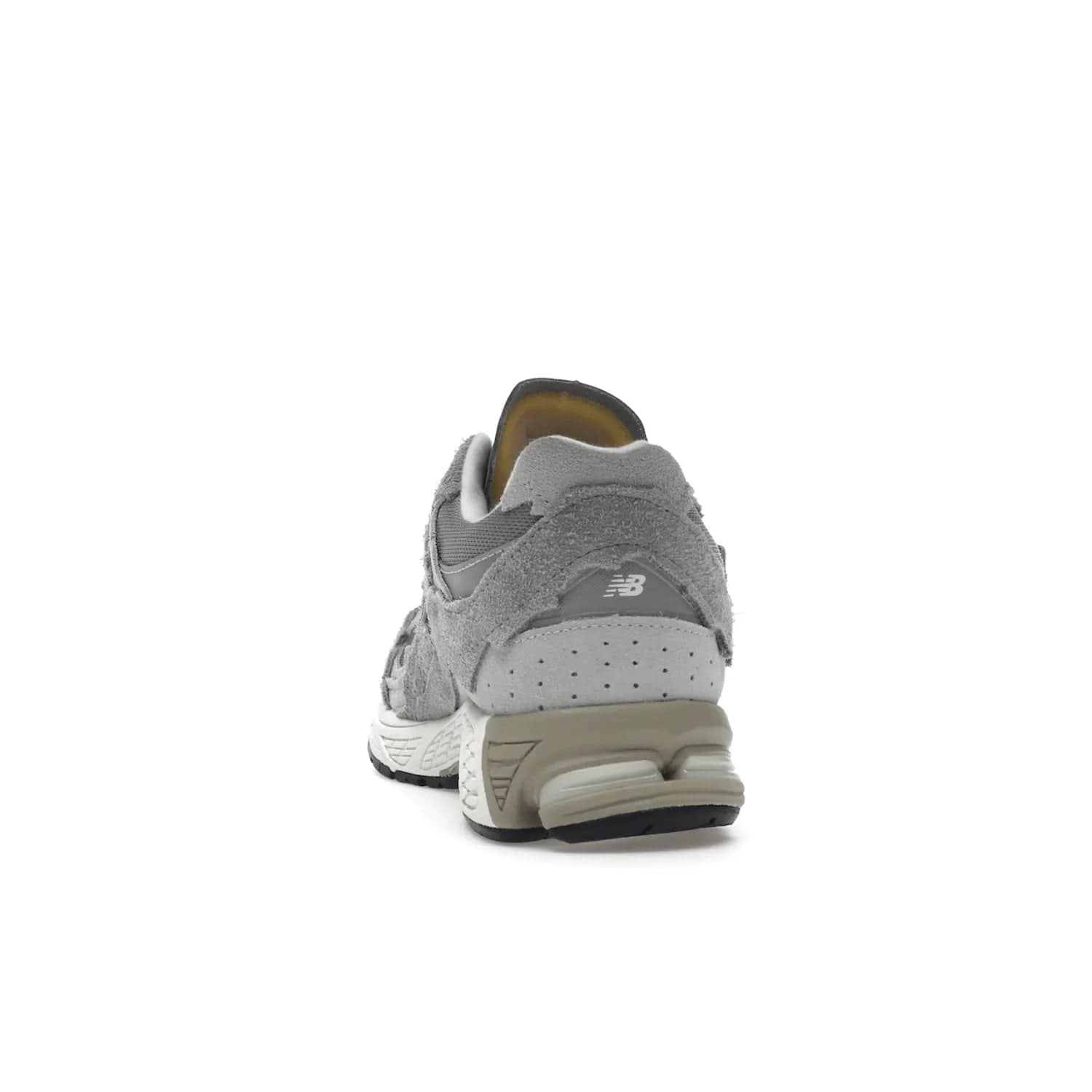 New Balance 2002R Protection Pack Grey - Image 27 - Only at www.BallersClubKickz.com - The New Balance 2002R Protection Pack Grey provides superior protection and all-day comfort. It features a blend of synthetic and mesh materials, foam midsole, rubber outsole, and a toe cap and heel counter. Show off the classic "N" logo and "2002R" lettering. Get a pair on February 14, 2023 for protection and style.