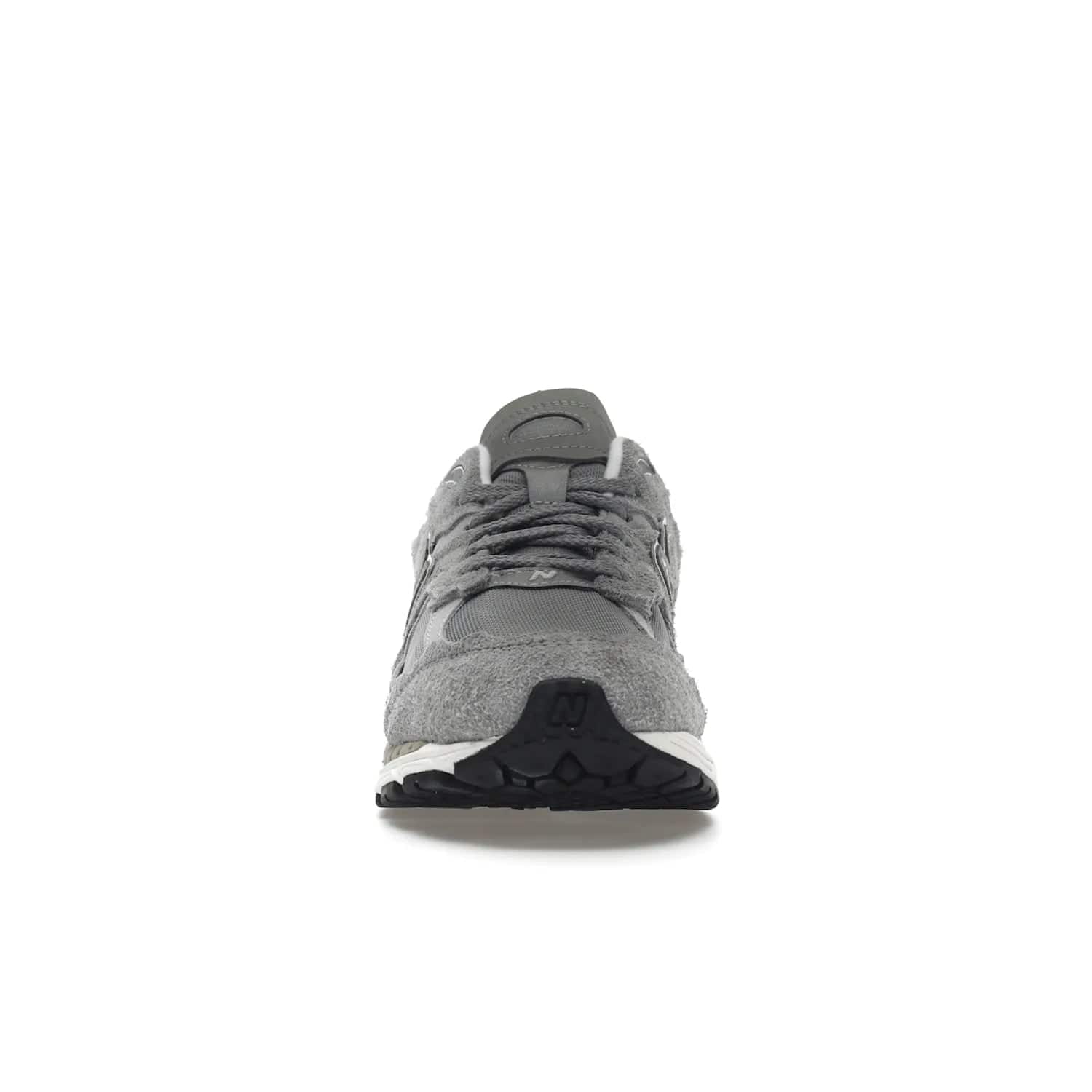 New Balance 2002R Protection Pack Grey - Image 10 - Only at www.BallersClubKickz.com - The New Balance 2002R Protection Pack Grey provides superior protection and all-day comfort. It features a blend of synthetic and mesh materials, foam midsole, rubber outsole, and a toe cap and heel counter. Show off the classic "N" logo and "2002R" lettering. Get a pair on February 14, 2023 for protection and style.