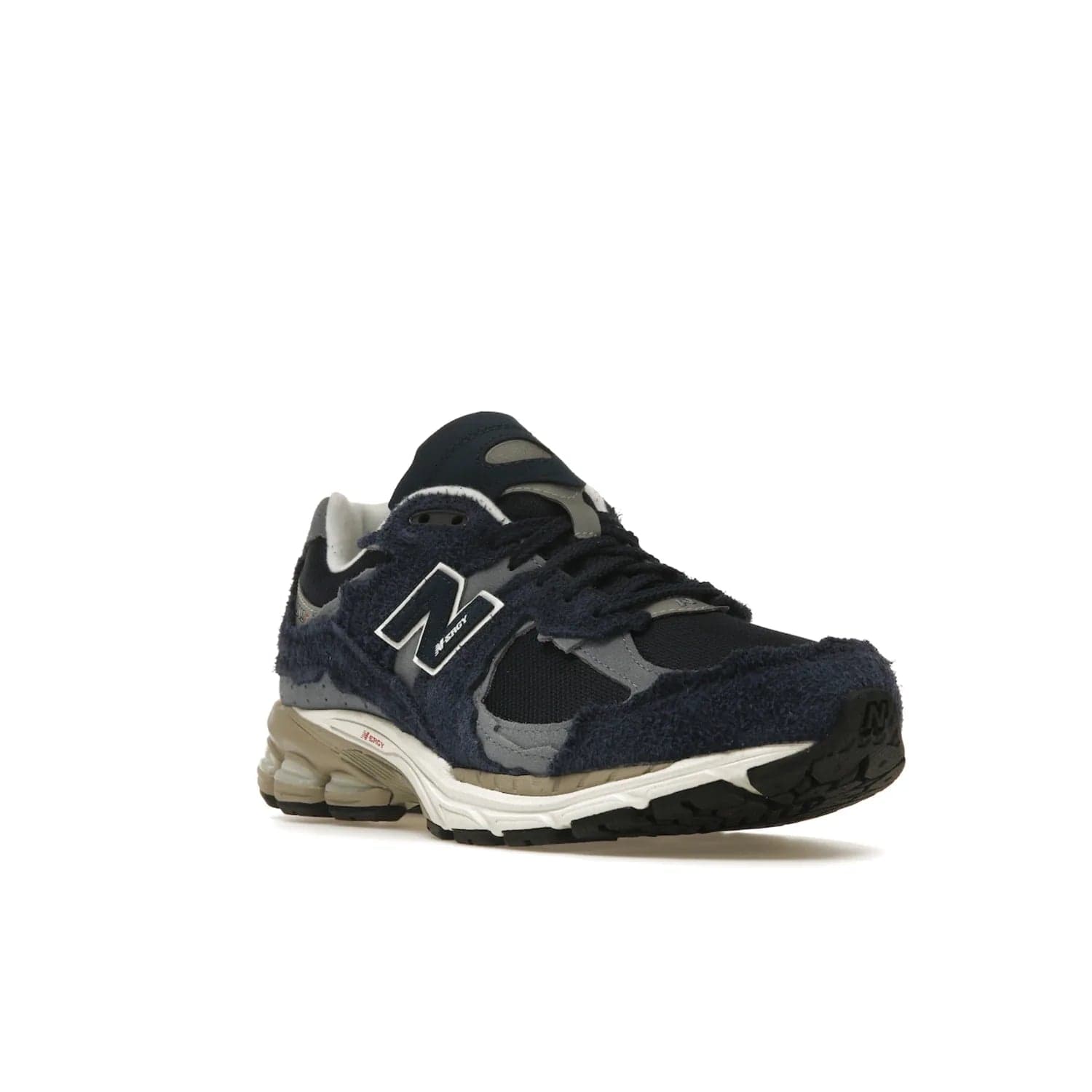 New Balance 2002R Protection Pack Navy Grey - Image 6 - Only at www.BallersClubKickz.com - Get the New Balance 2002R Protection Pack Navy Grey for a statement look. Crafted by Yue Wu, this sneaker features a mesh base, navy suede overlays, and a white and earth midsole. Released Feb 14, 2023.