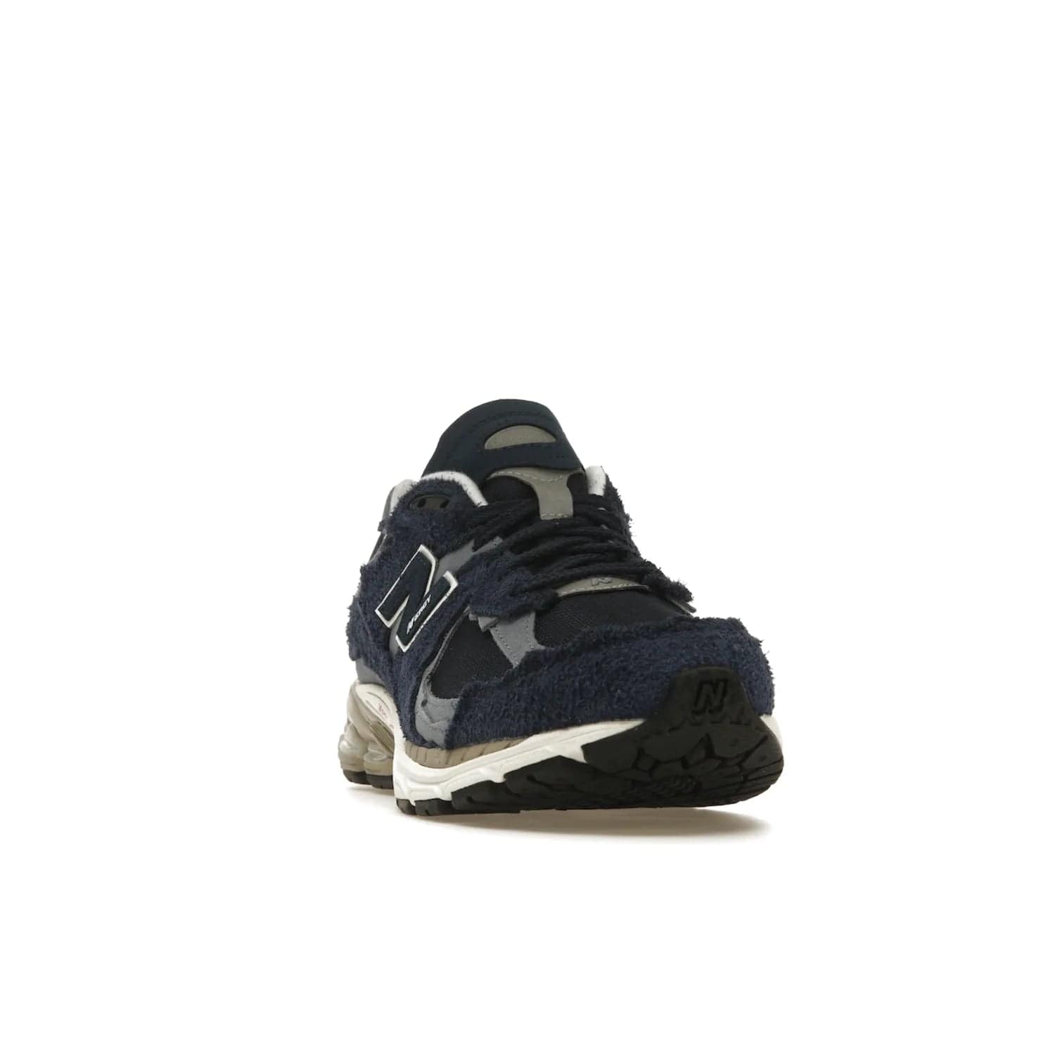 New Balance 2002R Protection Pack Navy Grey - Image 8 - Only at www.BallersClubKickz.com - Get the New Balance 2002R Protection Pack Navy Grey for a statement look. Crafted by Yue Wu, this sneaker features a mesh base, navy suede overlays, and a white and earth midsole. Released Feb 14, 2023.