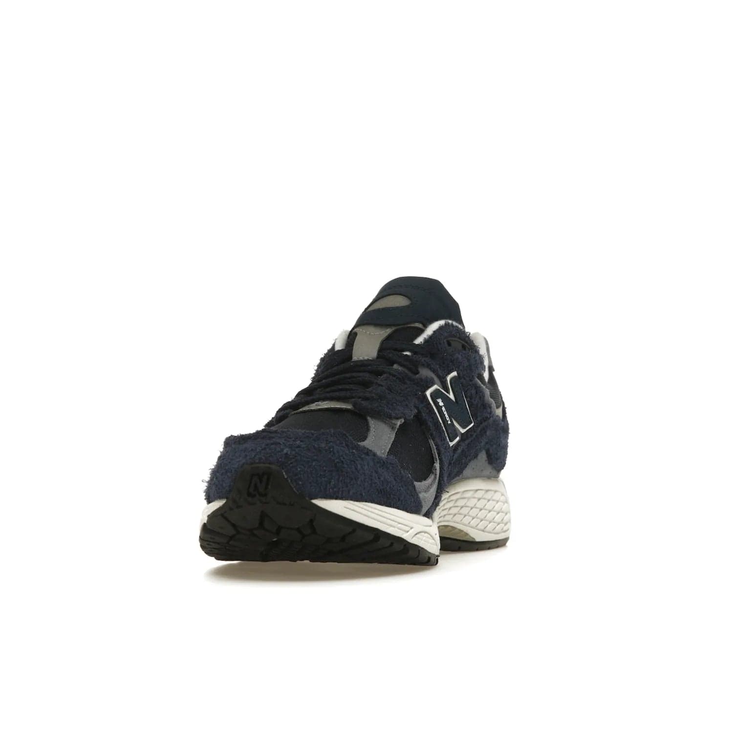 New Balance 2002R Protection Pack Navy Grey - Image 12 - Only at www.BallersClubKickz.com - Get the New Balance 2002R Protection Pack Navy Grey for a statement look. Crafted by Yue Wu, this sneaker features a mesh base, navy suede overlays, and a white and earth midsole. Released Feb 14, 2023.