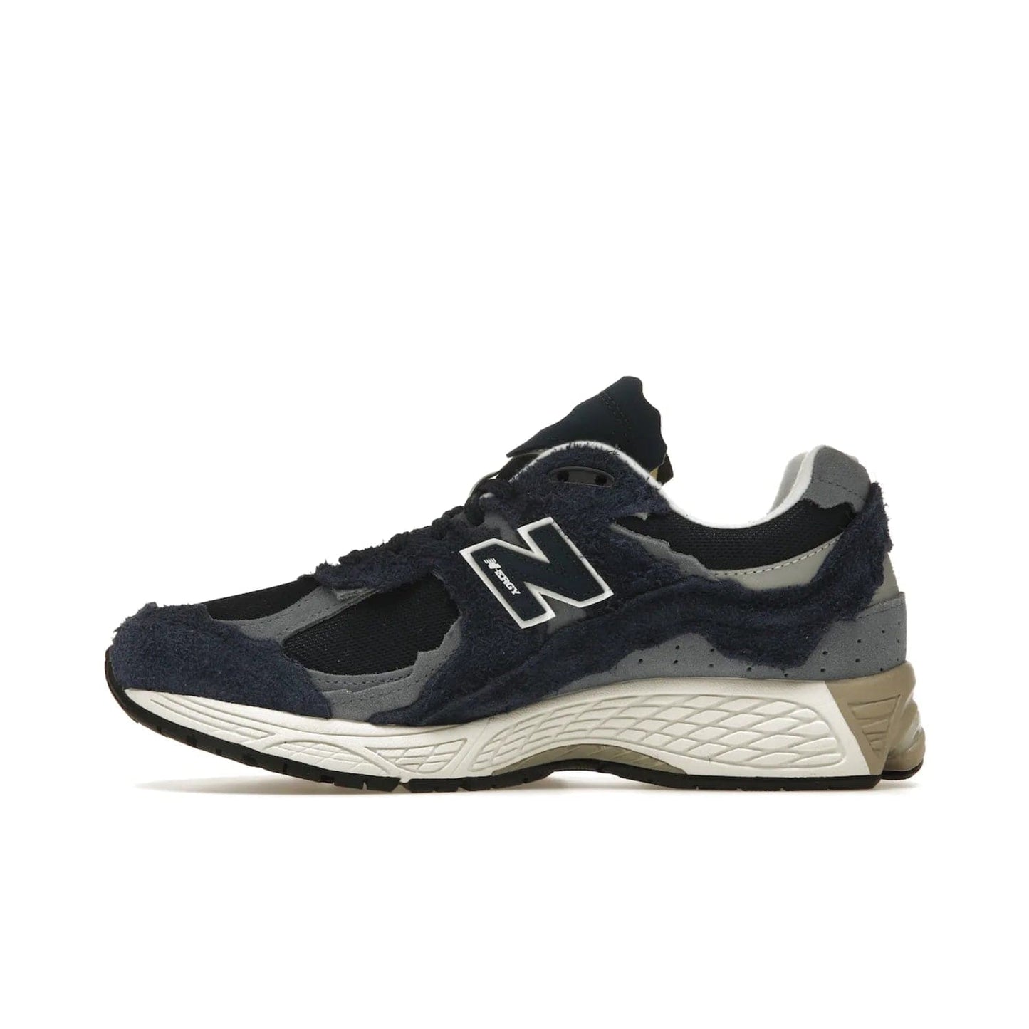 New Balance 2002R Protection Pack Navy Grey - Image 19 - Only at www.BallersClubKickz.com - Get the New Balance 2002R Protection Pack Navy Grey for a statement look. Crafted by Yue Wu, this sneaker features a mesh base, navy suede overlays, and a white and earth midsole. Released Feb 14, 2023.