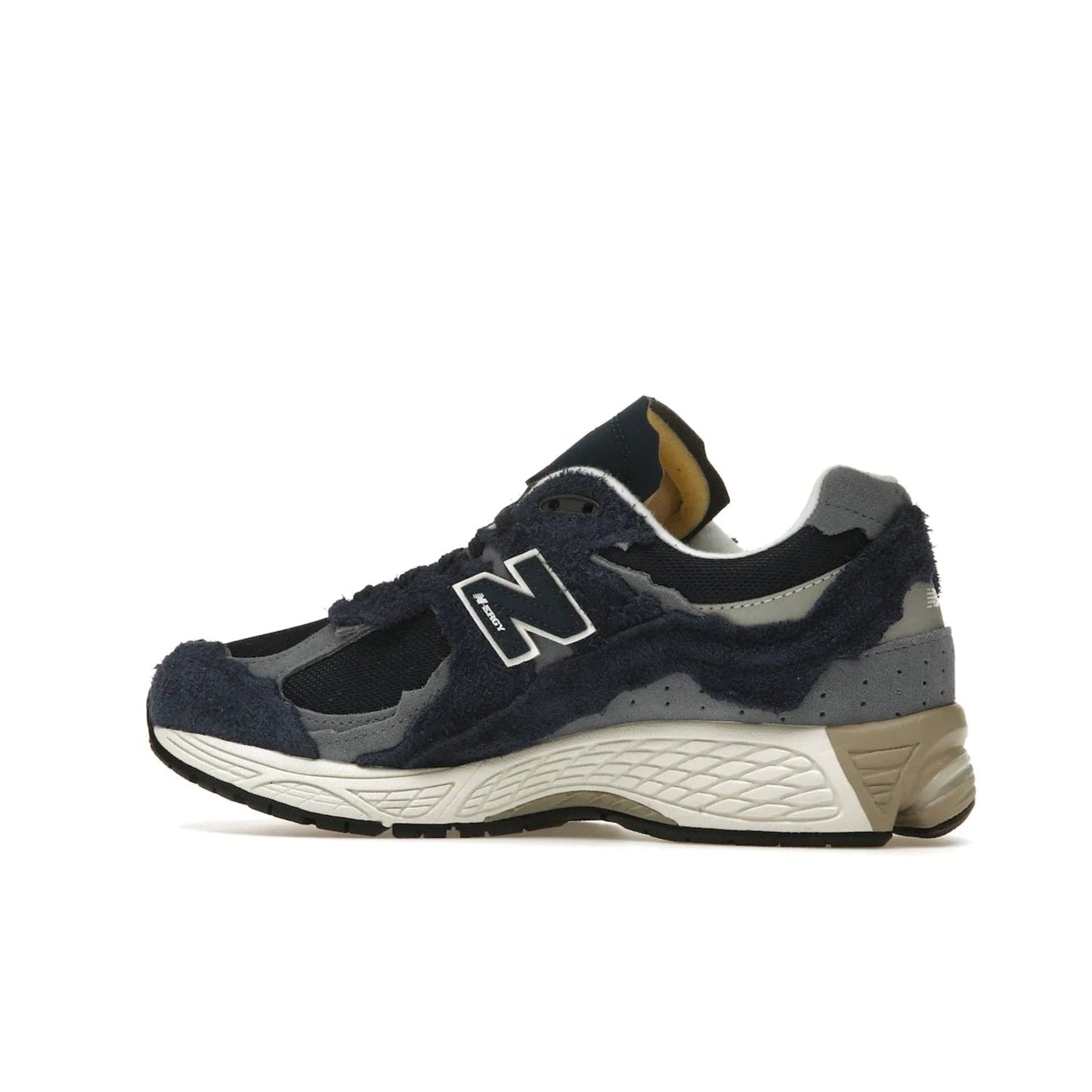New Balance 2002R Protection Pack Navy Grey - Image 21 - Only at www.BallersClubKickz.com - Get the New Balance 2002R Protection Pack Navy Grey for a statement look. Crafted by Yue Wu, this sneaker features a mesh base, navy suede overlays, and a white and earth midsole. Released Feb 14, 2023.
