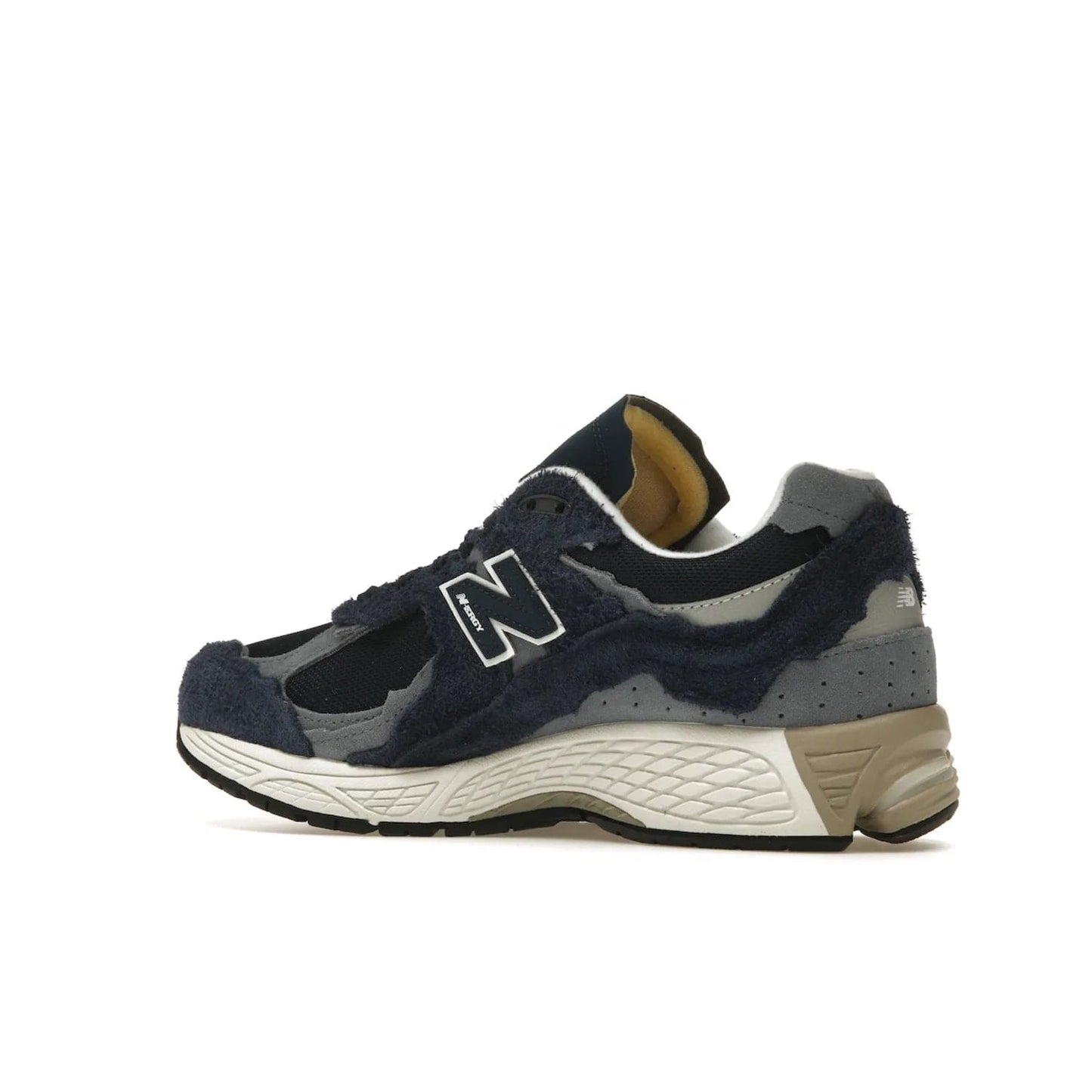 New Balance 2002R Protection Pack Navy Grey - Image 22 - Only at www.BallersClubKickz.com - Get the New Balance 2002R Protection Pack Navy Grey for a statement look. Crafted by Yue Wu, this sneaker features a mesh base, navy suede overlays, and a white and earth midsole. Released Feb 14, 2023.